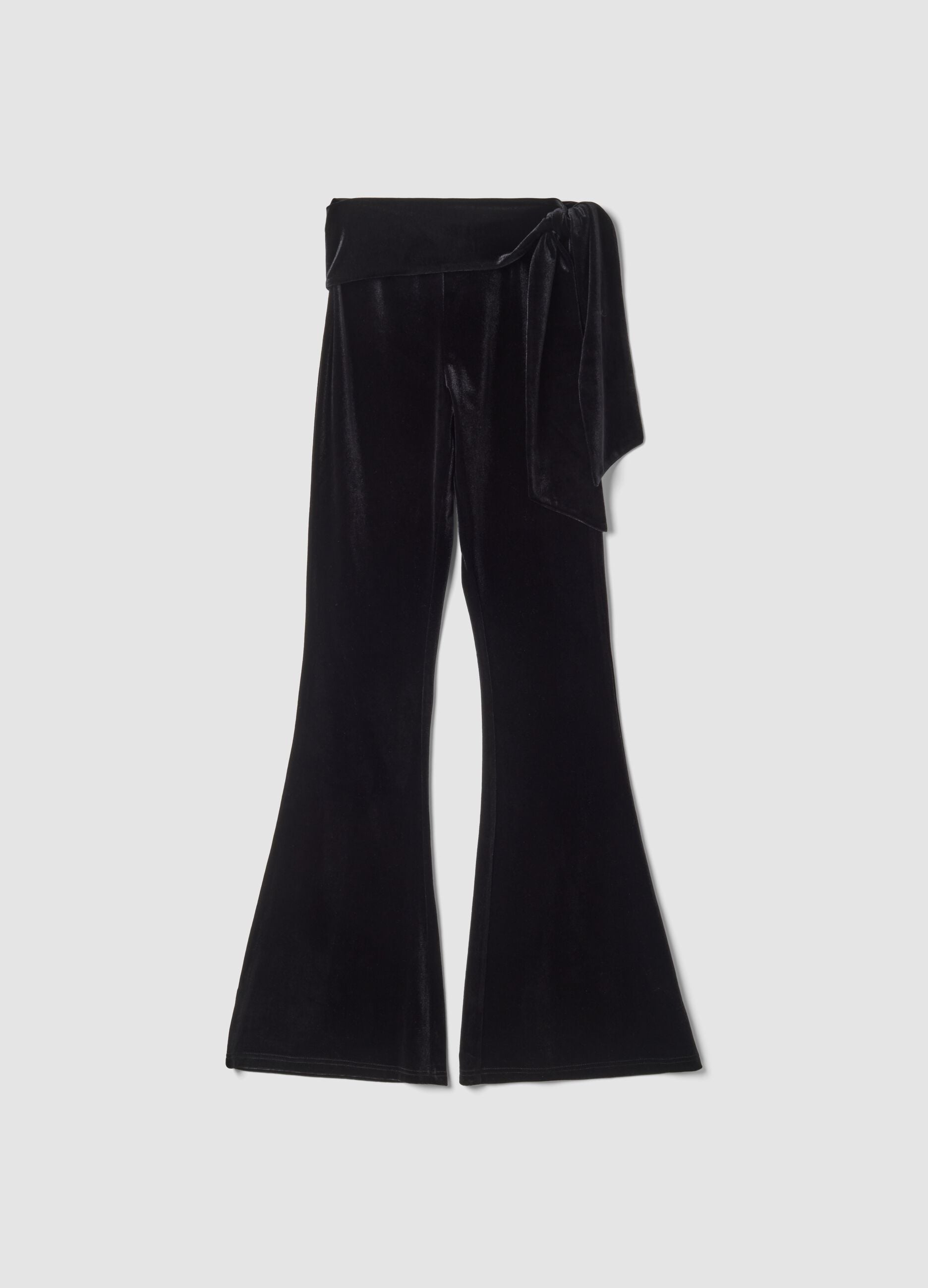 Black velour flare trousers in stretch fabric with side bow detail