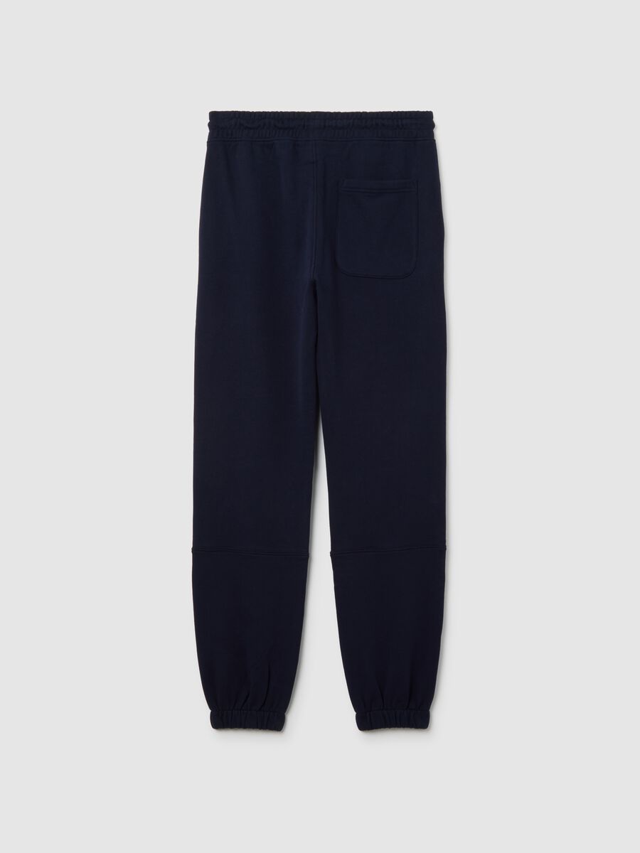 Boys' blue jogger trousers in pure cotton with oversized fit_1