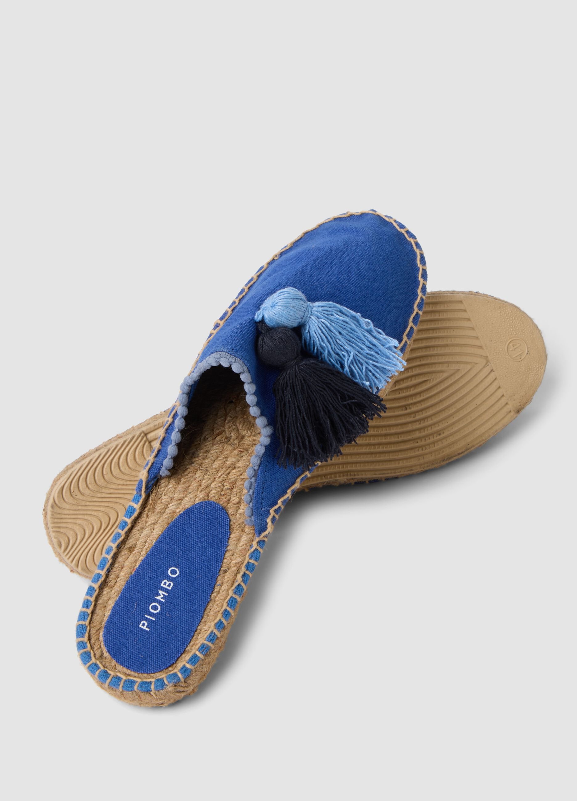 Blue mules with tassels