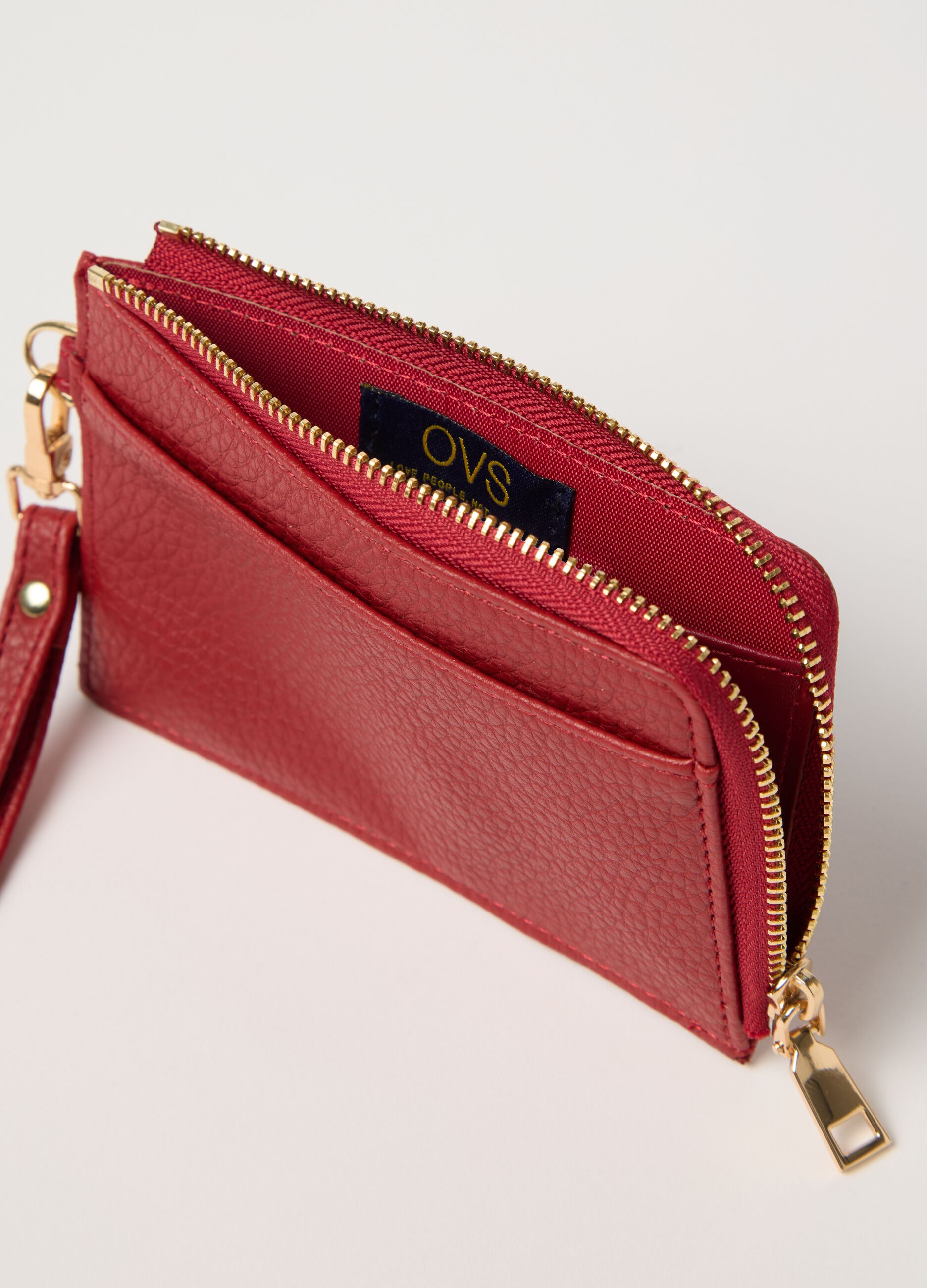 Textured red wallet with strap