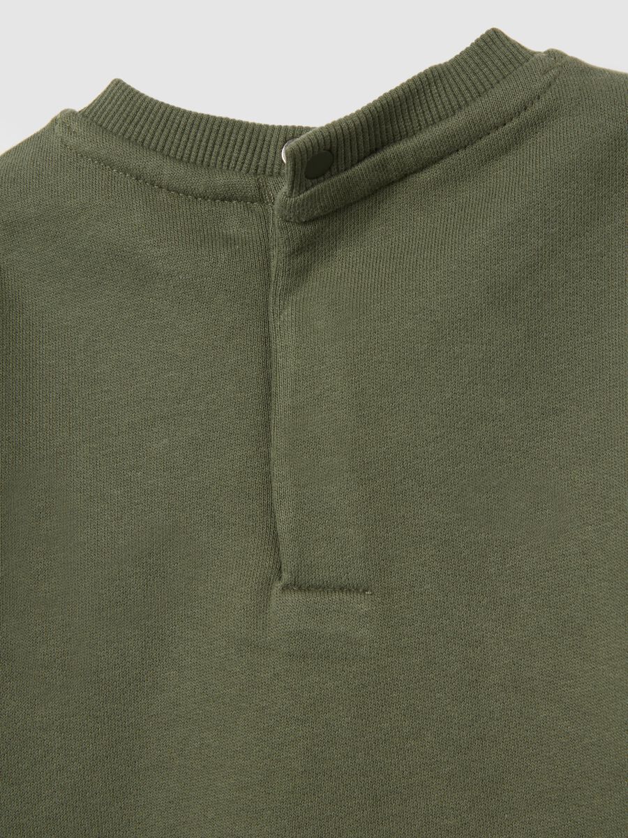 Green tracksuit with sweatshirt and trousers for child_3