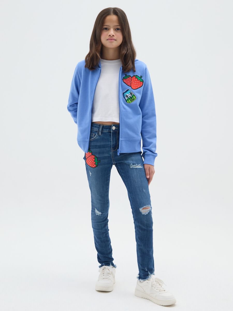 Slim-fit destroyed jeans with five pockets_0