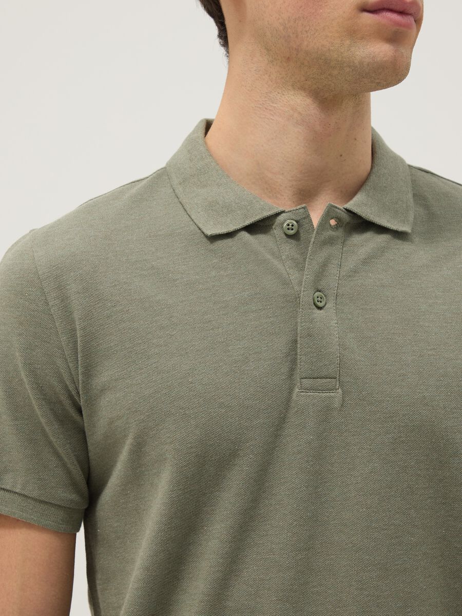Short-sleeved green polo shirt in pure cotton_3