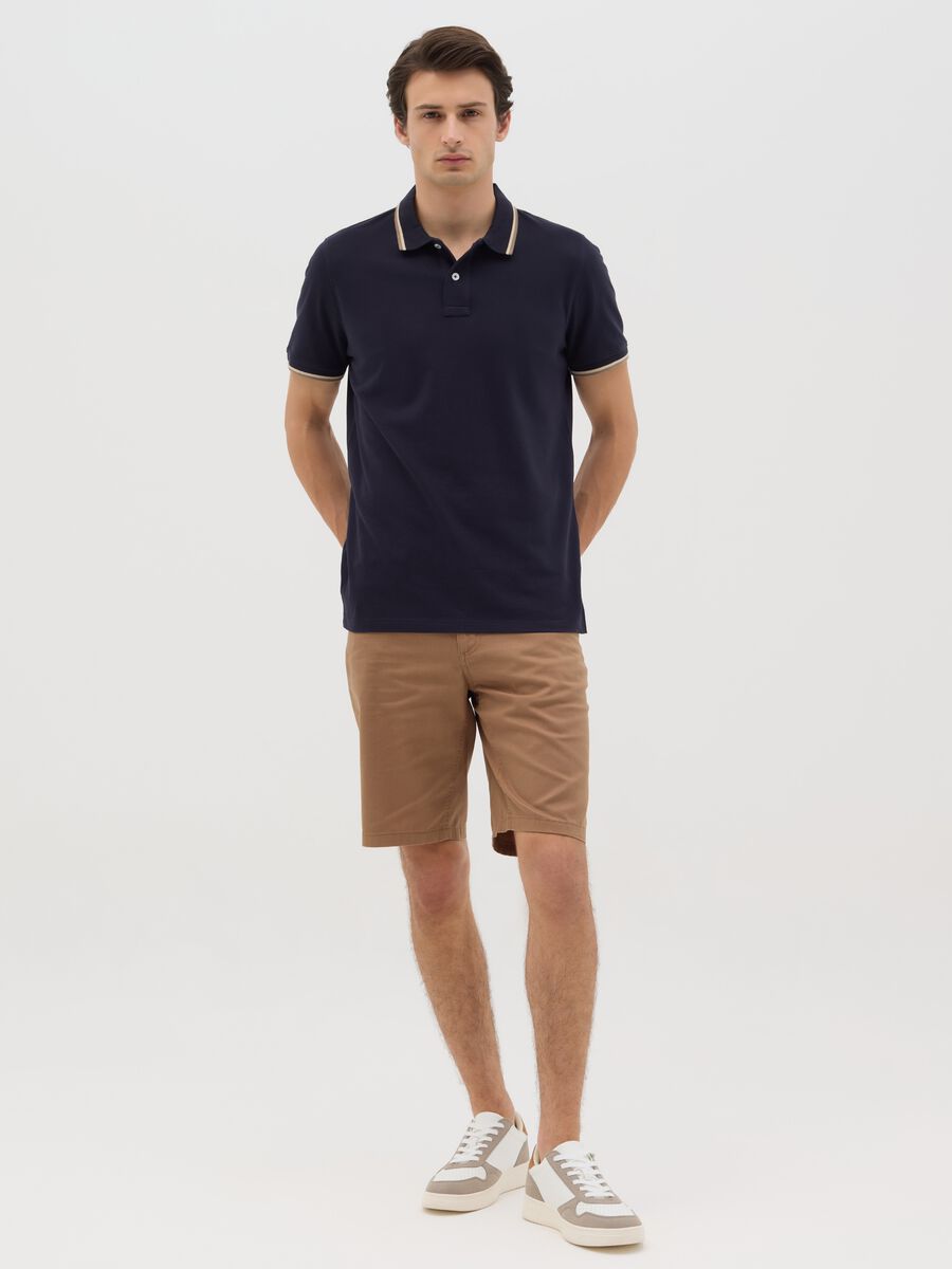 Blue short sleeve polo shirt in pure cotton_1