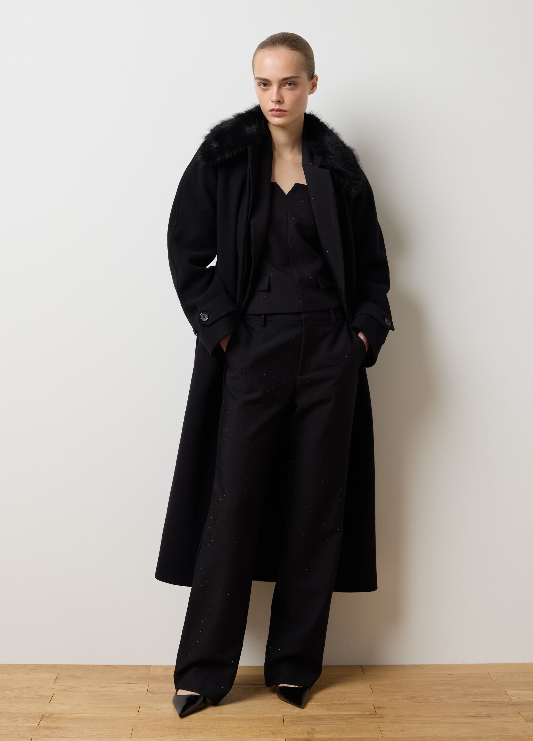 Long black coat with soft collar and regular fit belt