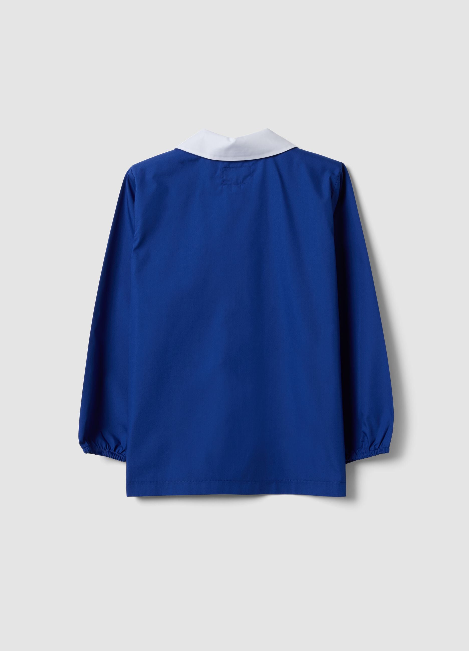 Blue kids&rsquo; school smock with gaming print and white collar