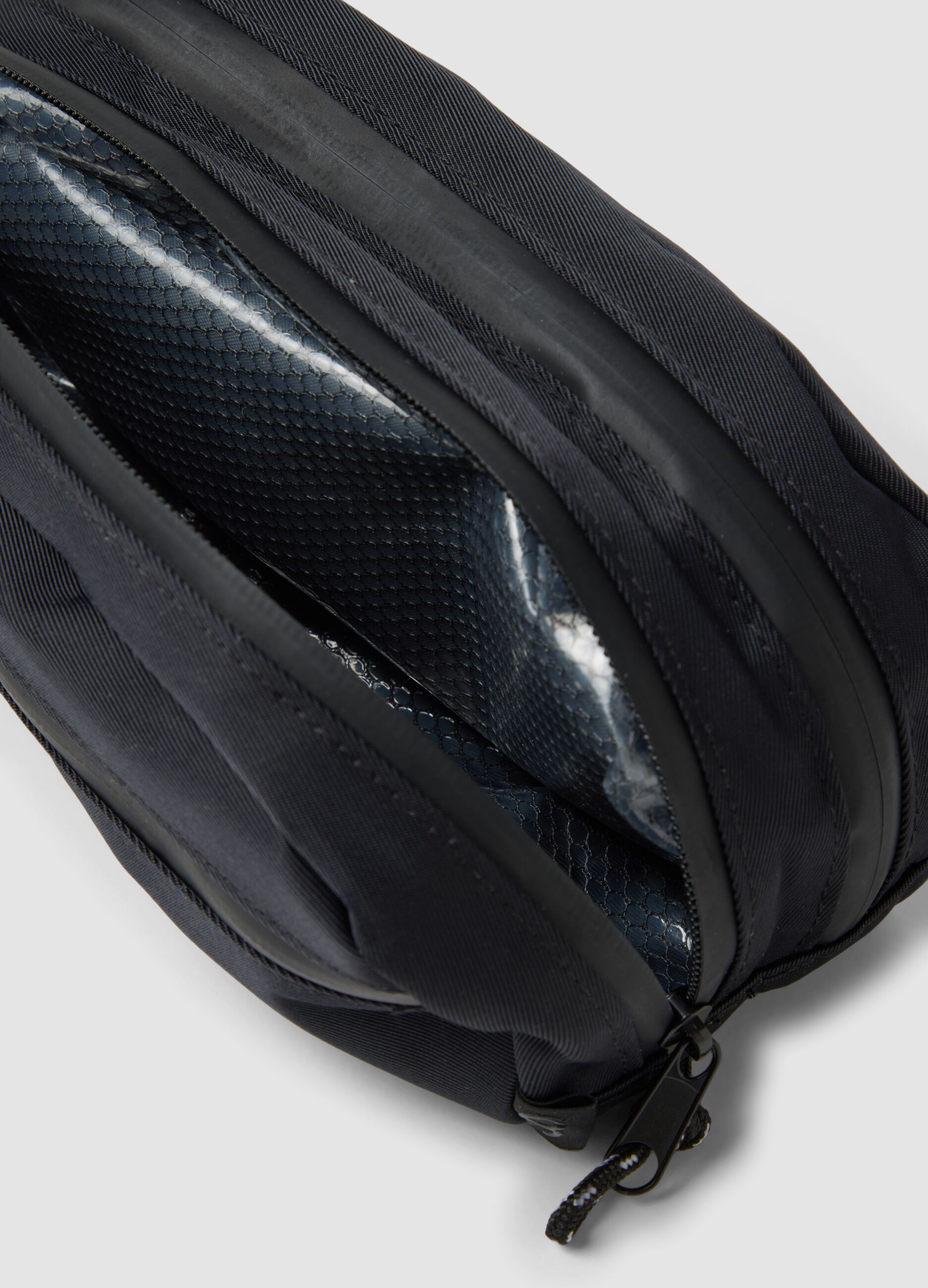 Black toiletry bag with front pocket and zip