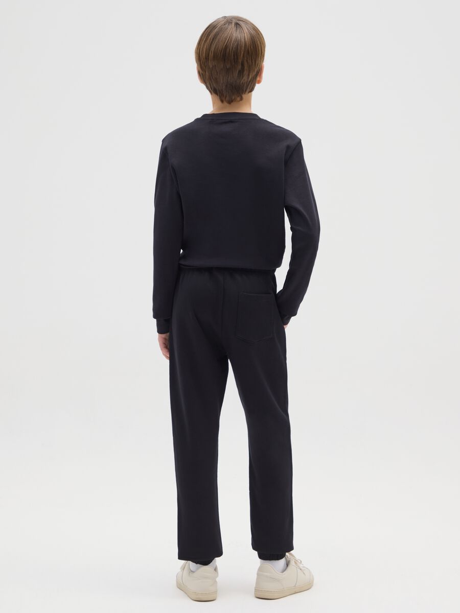 Pantaloni jogger da ragazzo in puro cotone nero regular fit_1