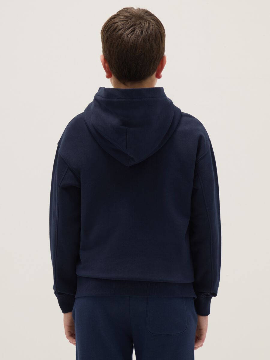 Boy's blue hoodie in pure cotton with oversized fit and zip_1