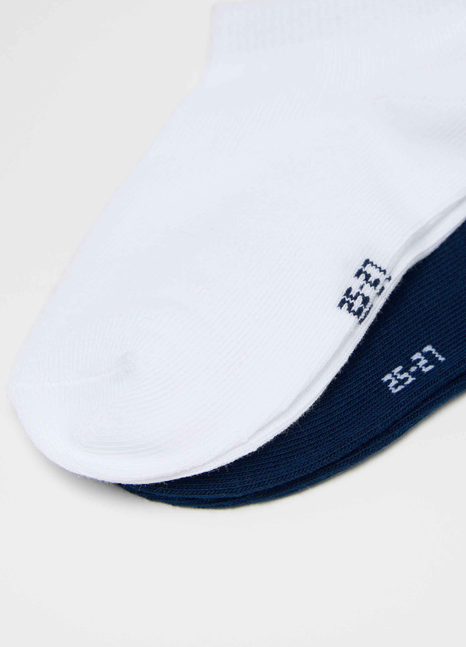 Five-pair pack orange and blue stretch shoe liners