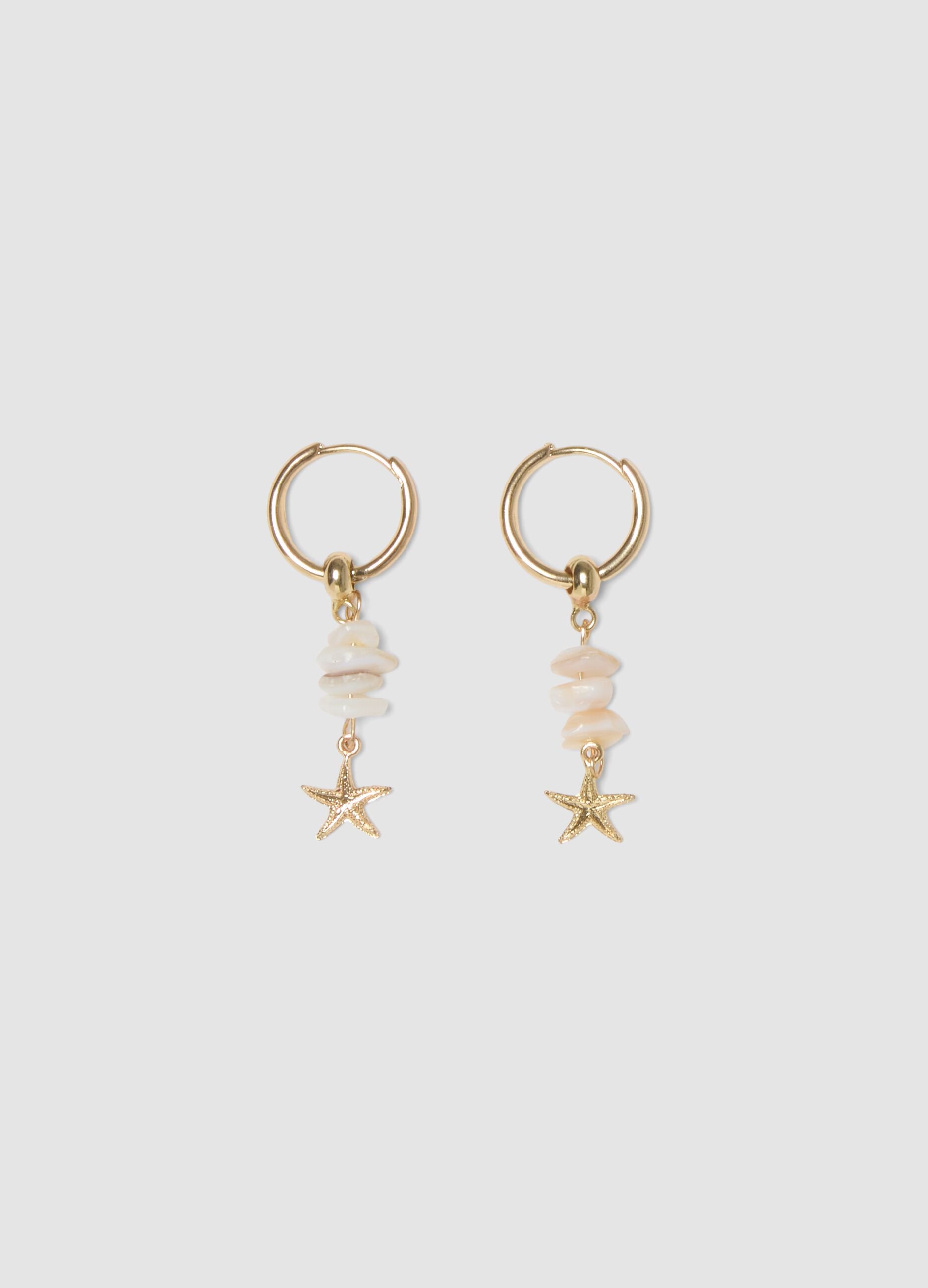Gold-tone earrings with starfish charm