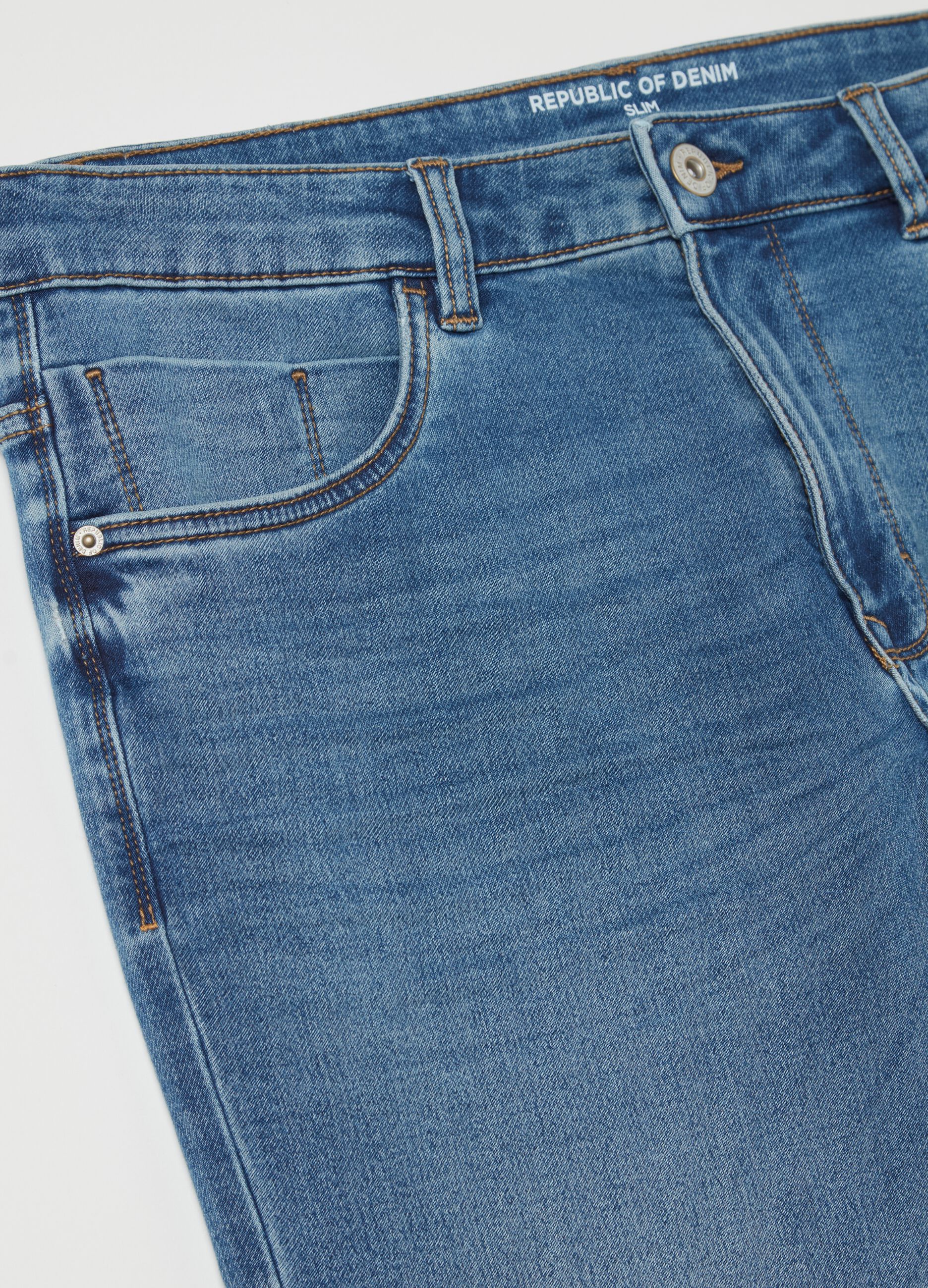 Slim-fit jeans with discolouring