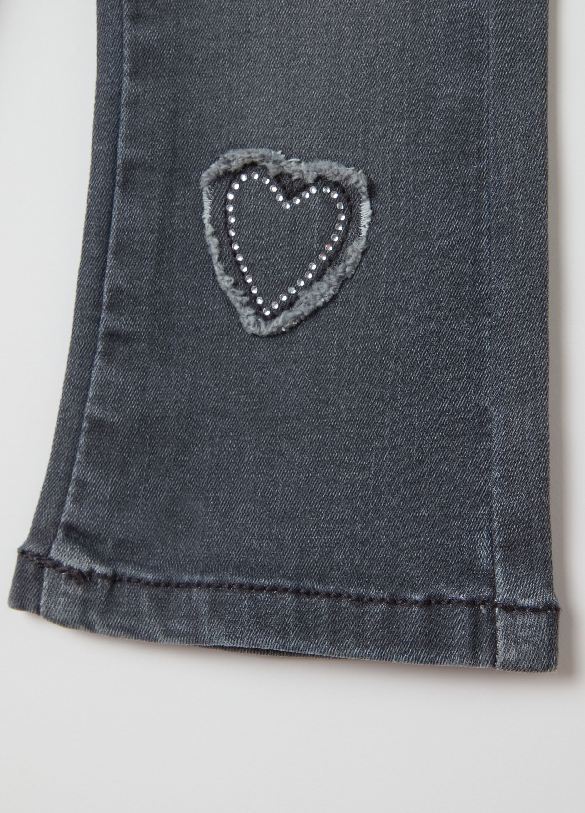 Flare-fit jeans with five pockets with diamantés