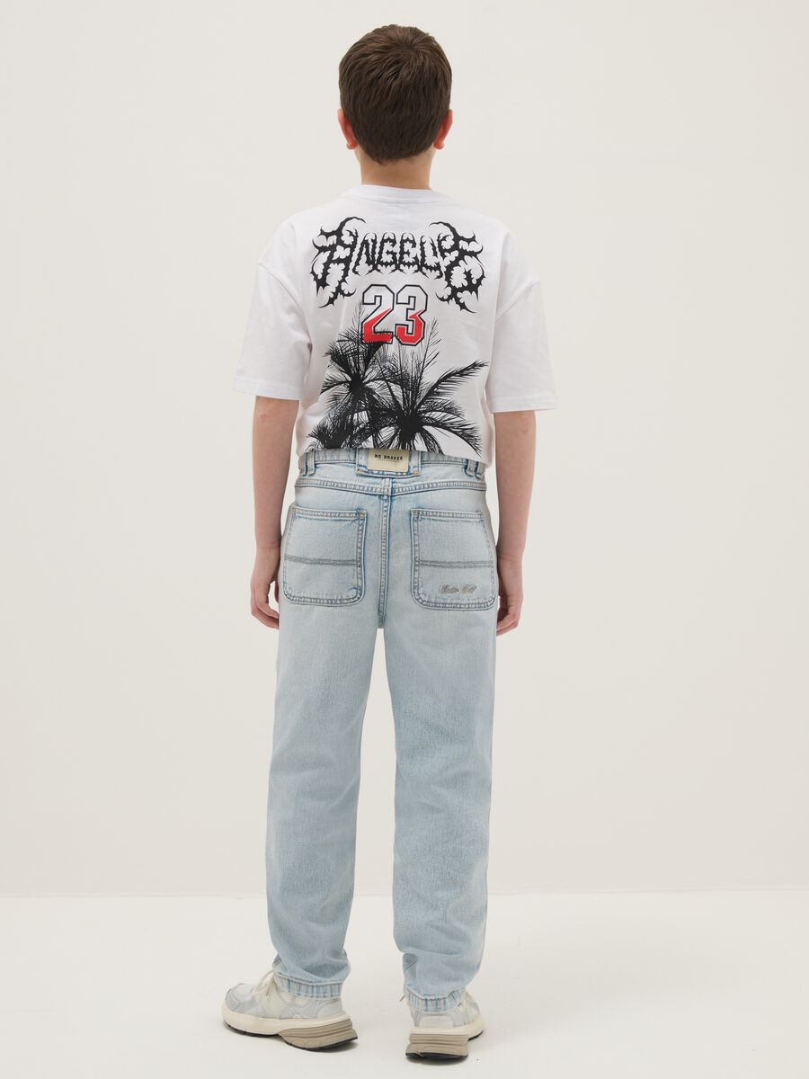 Jeans in puro cotone denim azzurro da ragazzo relaxed fit_1