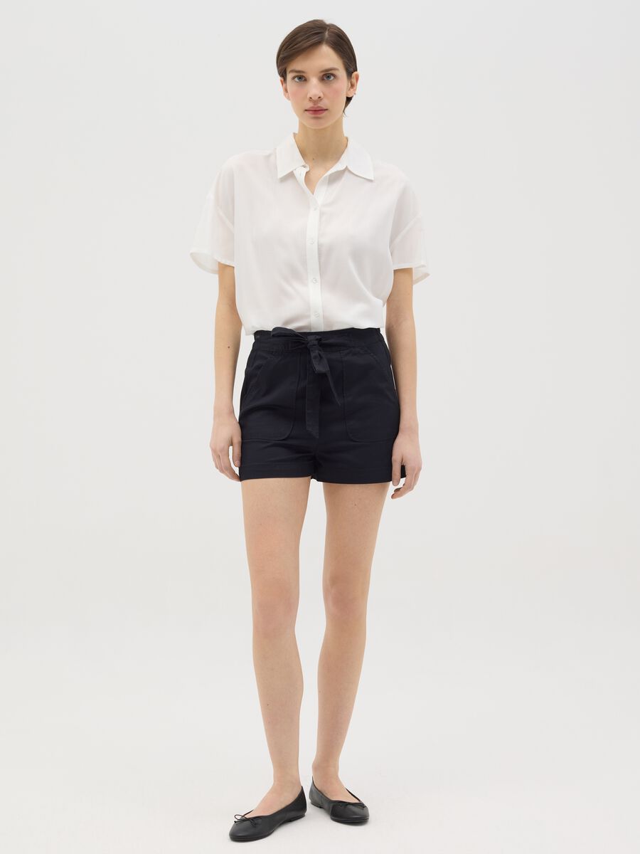 Fluid shorts in denim with bow_0