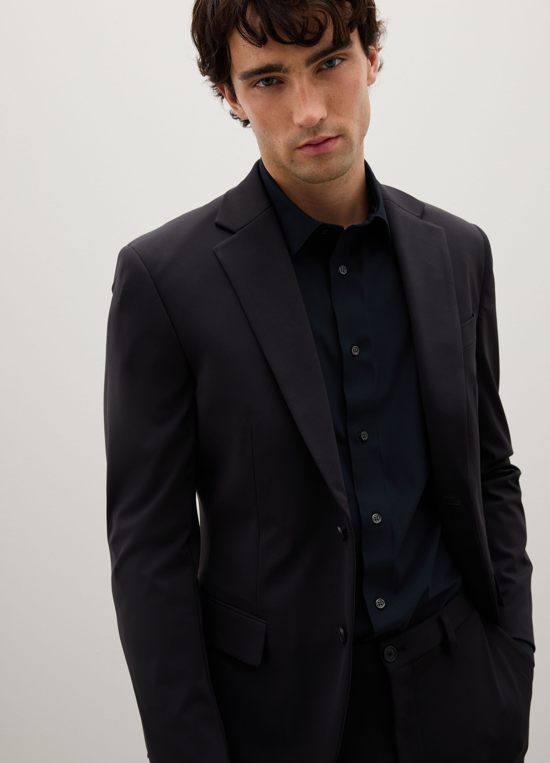 Blazer in tessuto elasticizzato nero slim fit