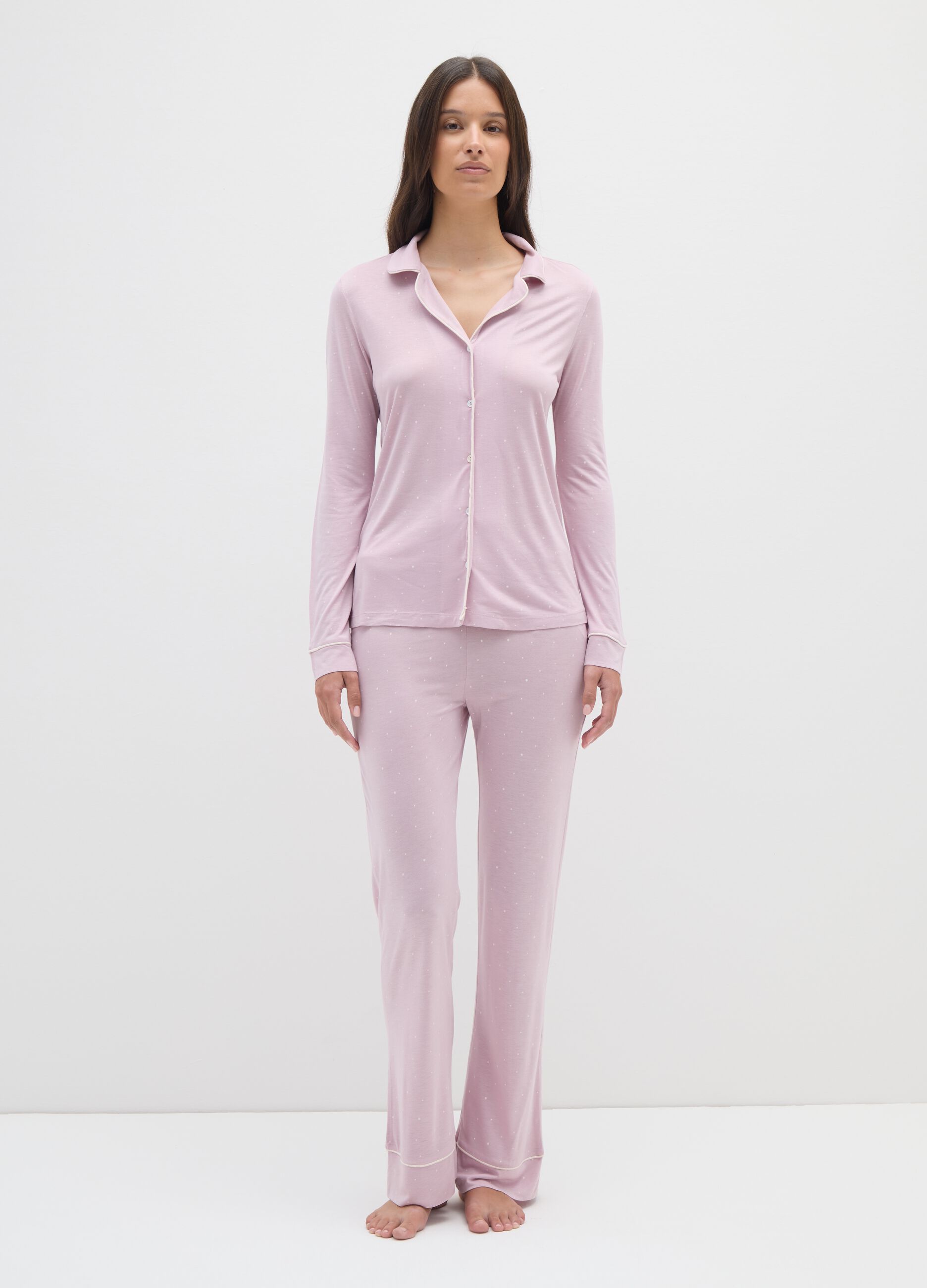 Purple polka dot pyjamas with button closure