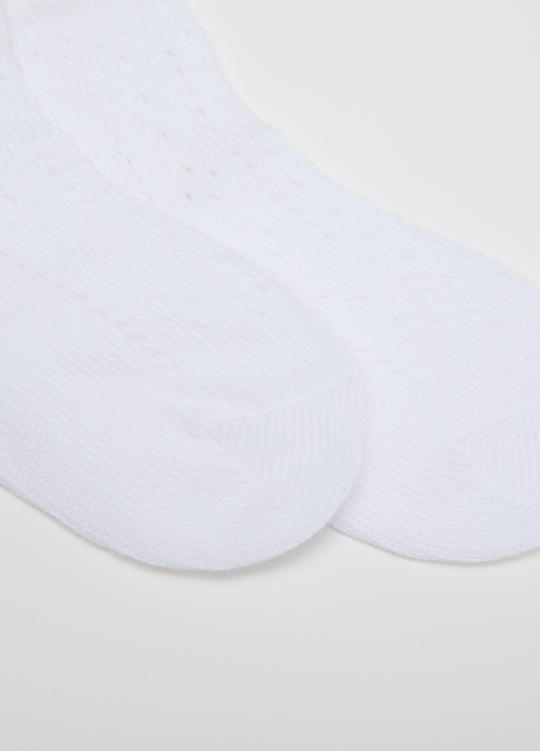 Short white socks with raised weave