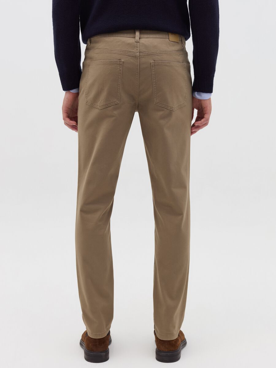 Trousers with five pockets and couture stitched weave_3