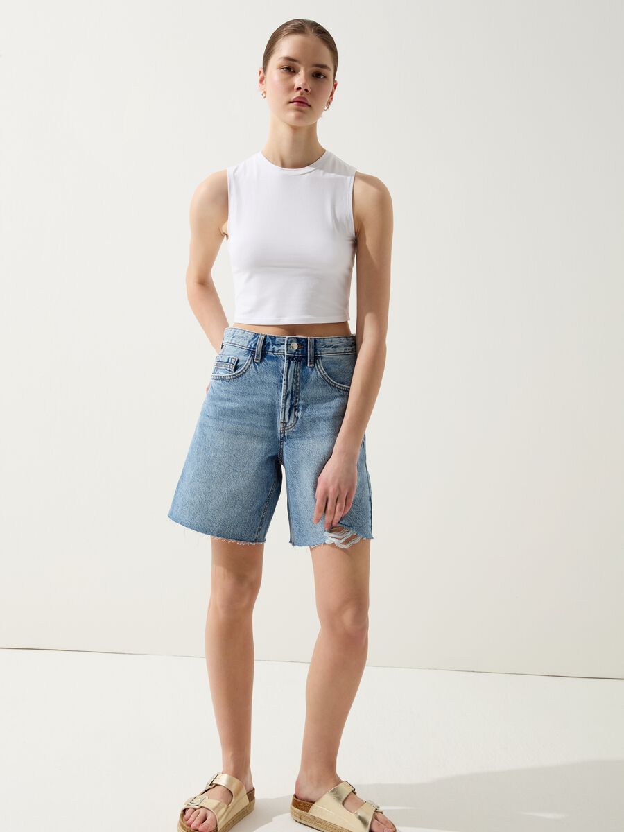 Denim Bermuda shorts with abrasions_0