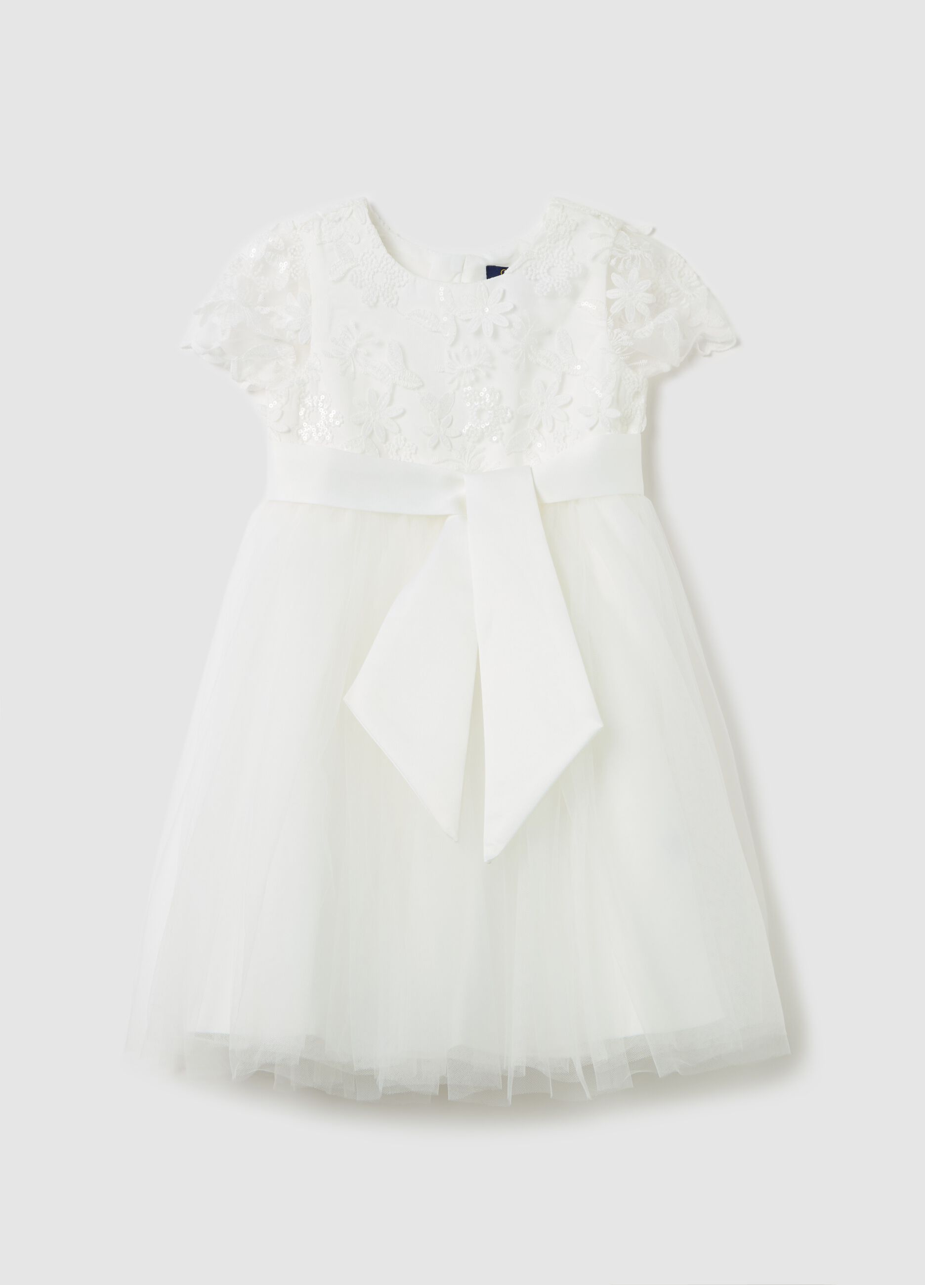 Tulle dress with floral applications