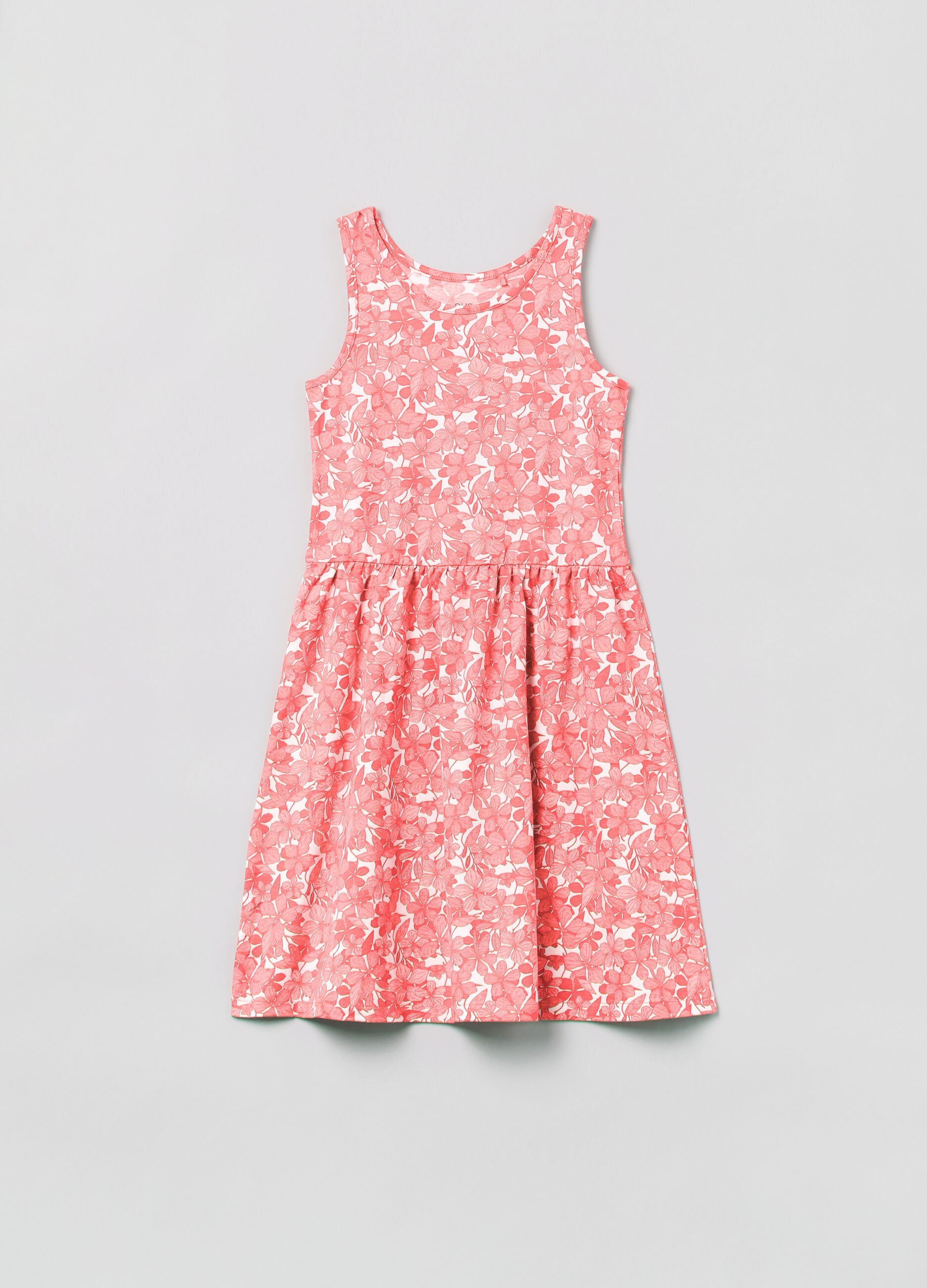Sleeveless dress with floral pattern.