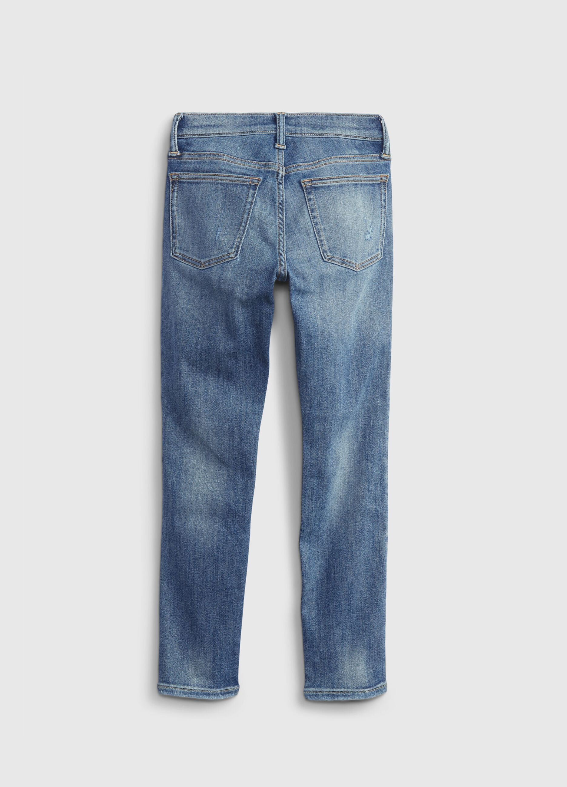 Jeans skinny fit con abrasioni
