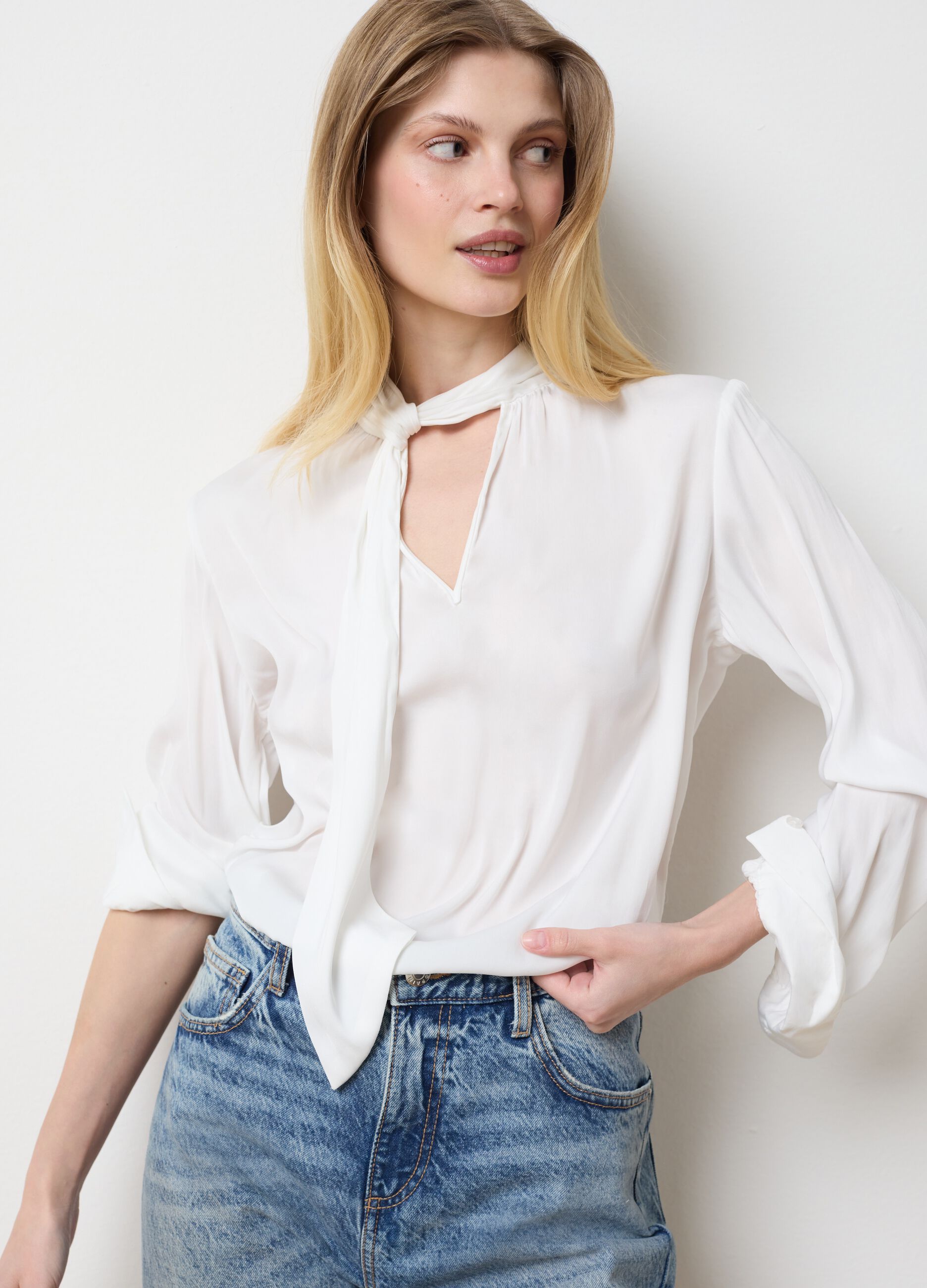 White blouse with bow