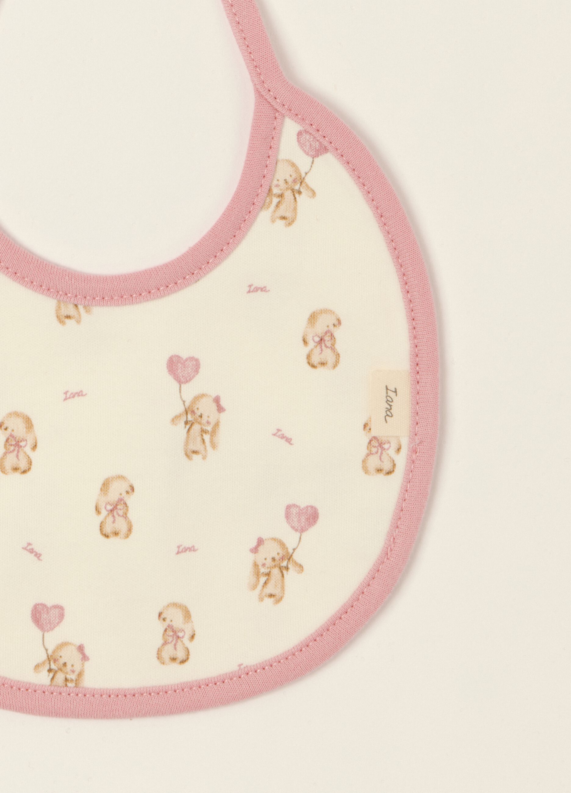 Two-pack of white pure cotton baby girl bibs with cute prints