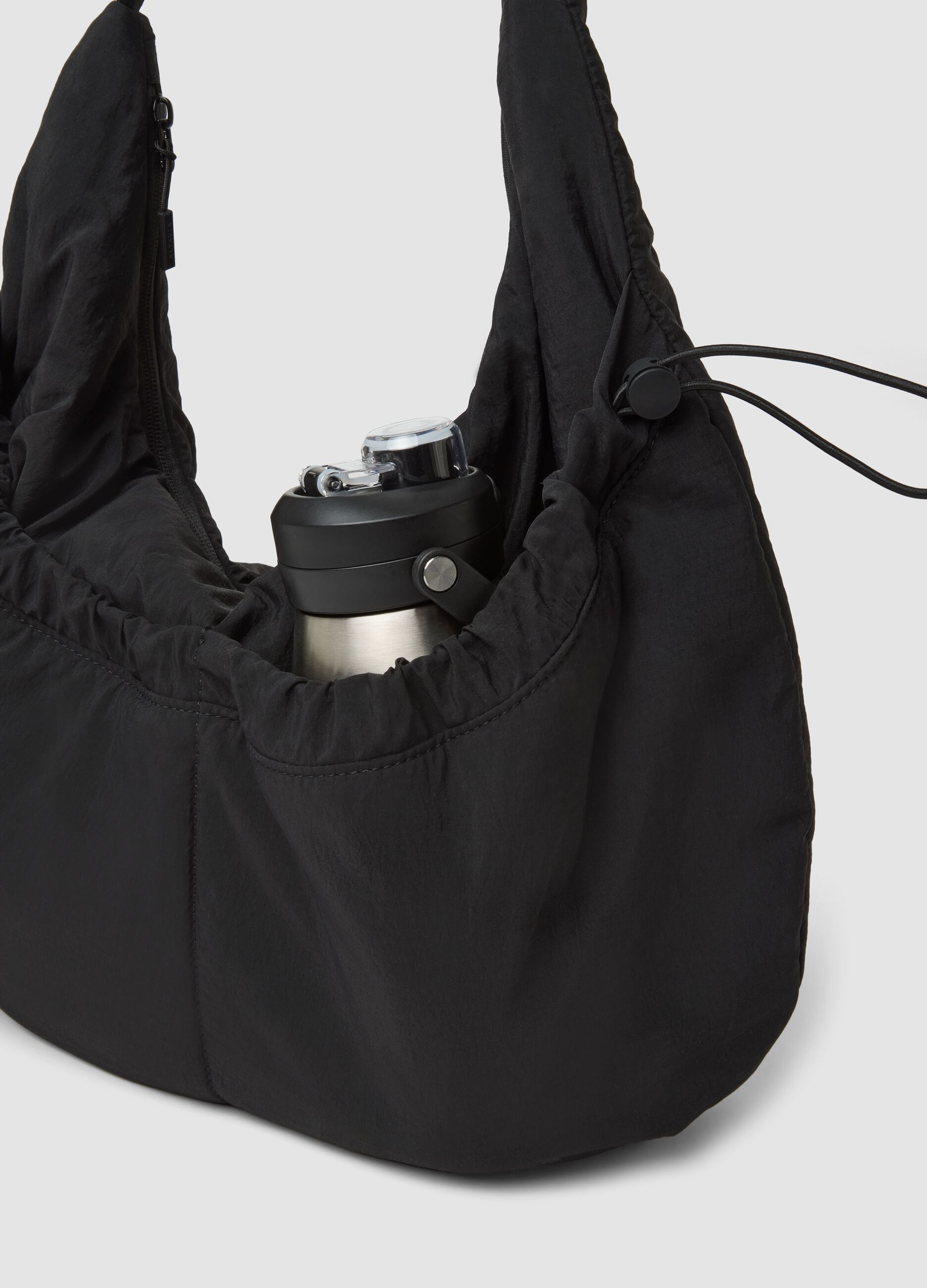 Black shoulder bag with adjustable strap