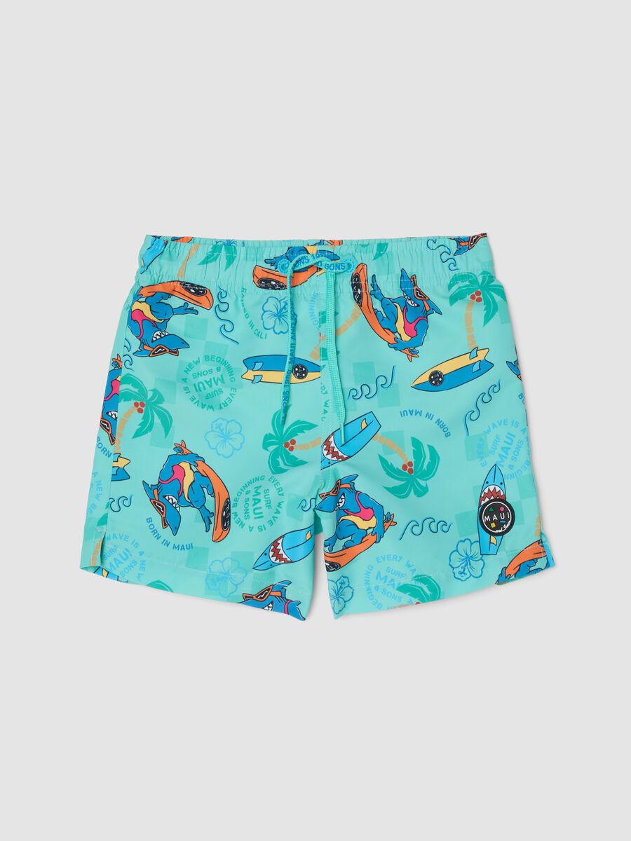 Blue boys&rsquo; swim shorts with tropical print_0
