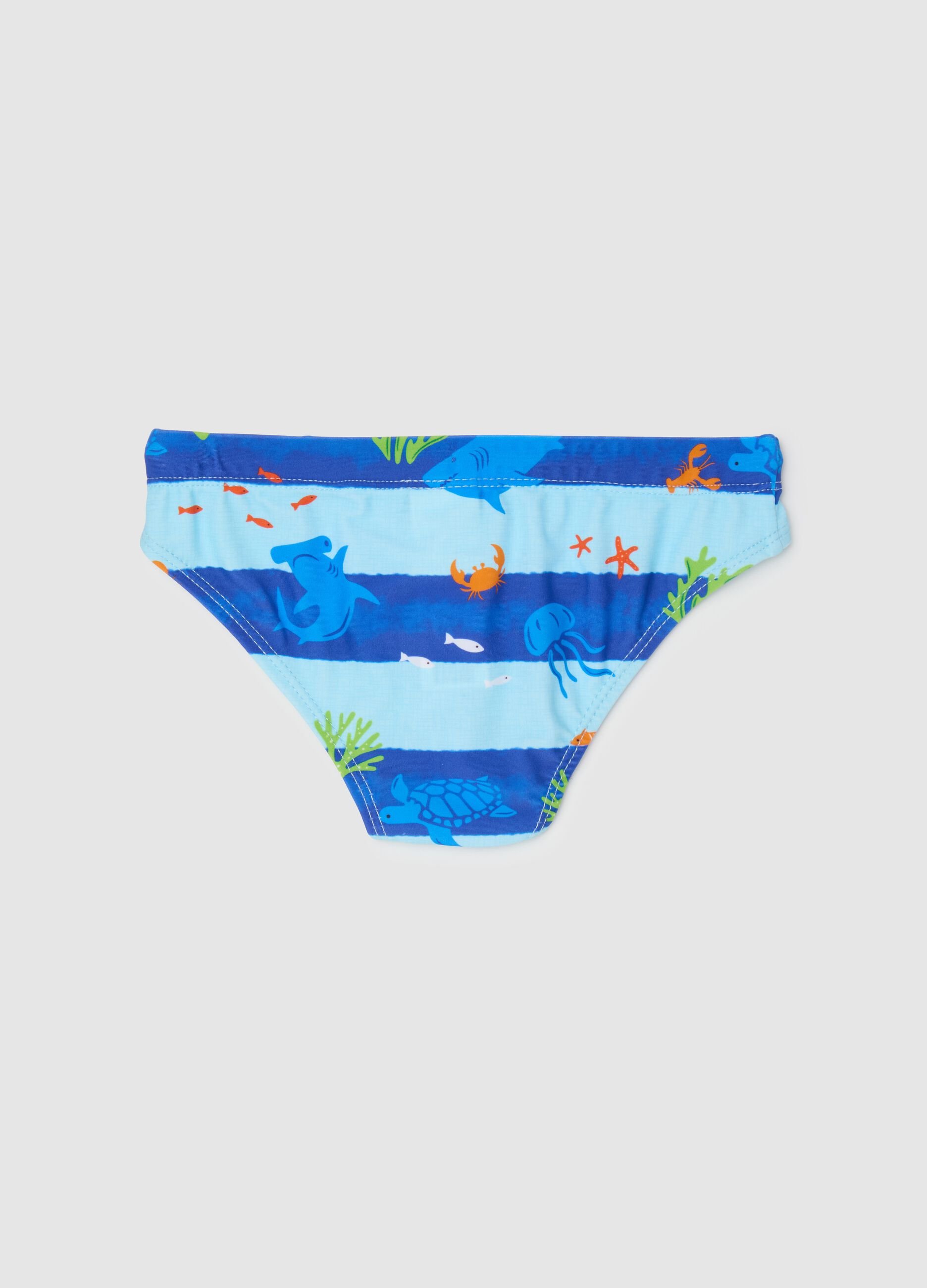 Blue kids' briefs with ocean pattern