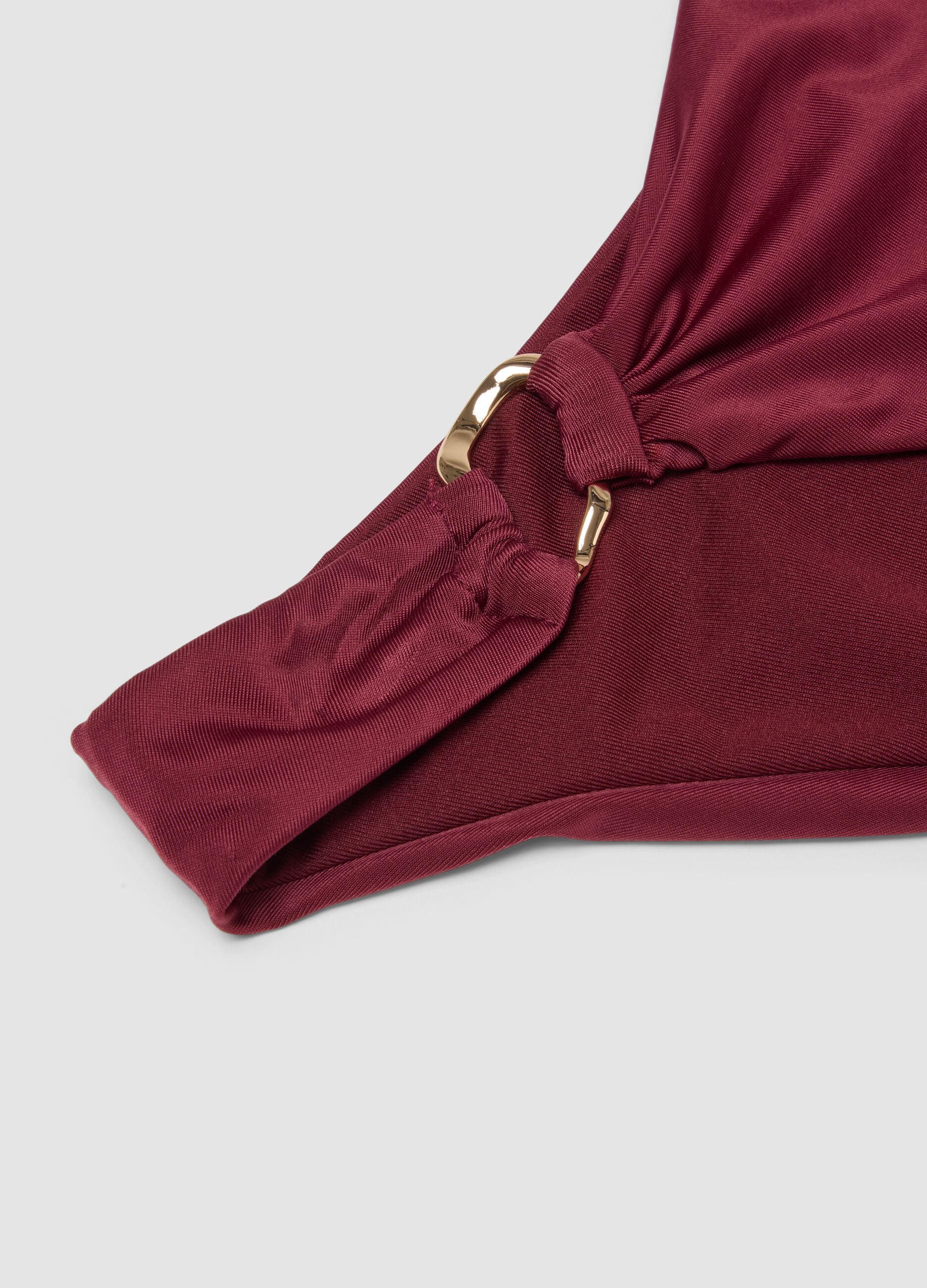 Red stretch bikini bottoms with gold-tone ring detail