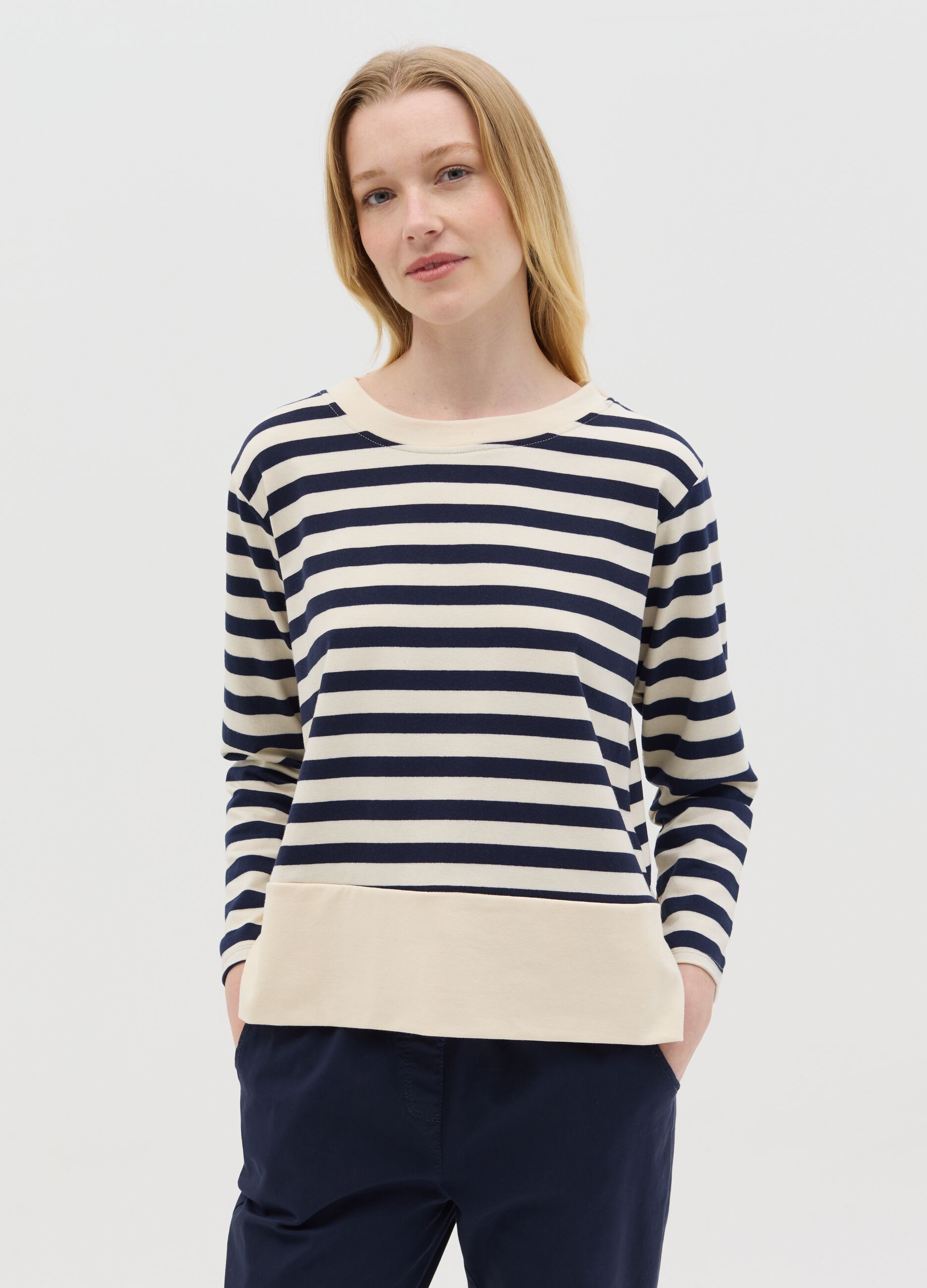 Blue and white striped top with long sleeves