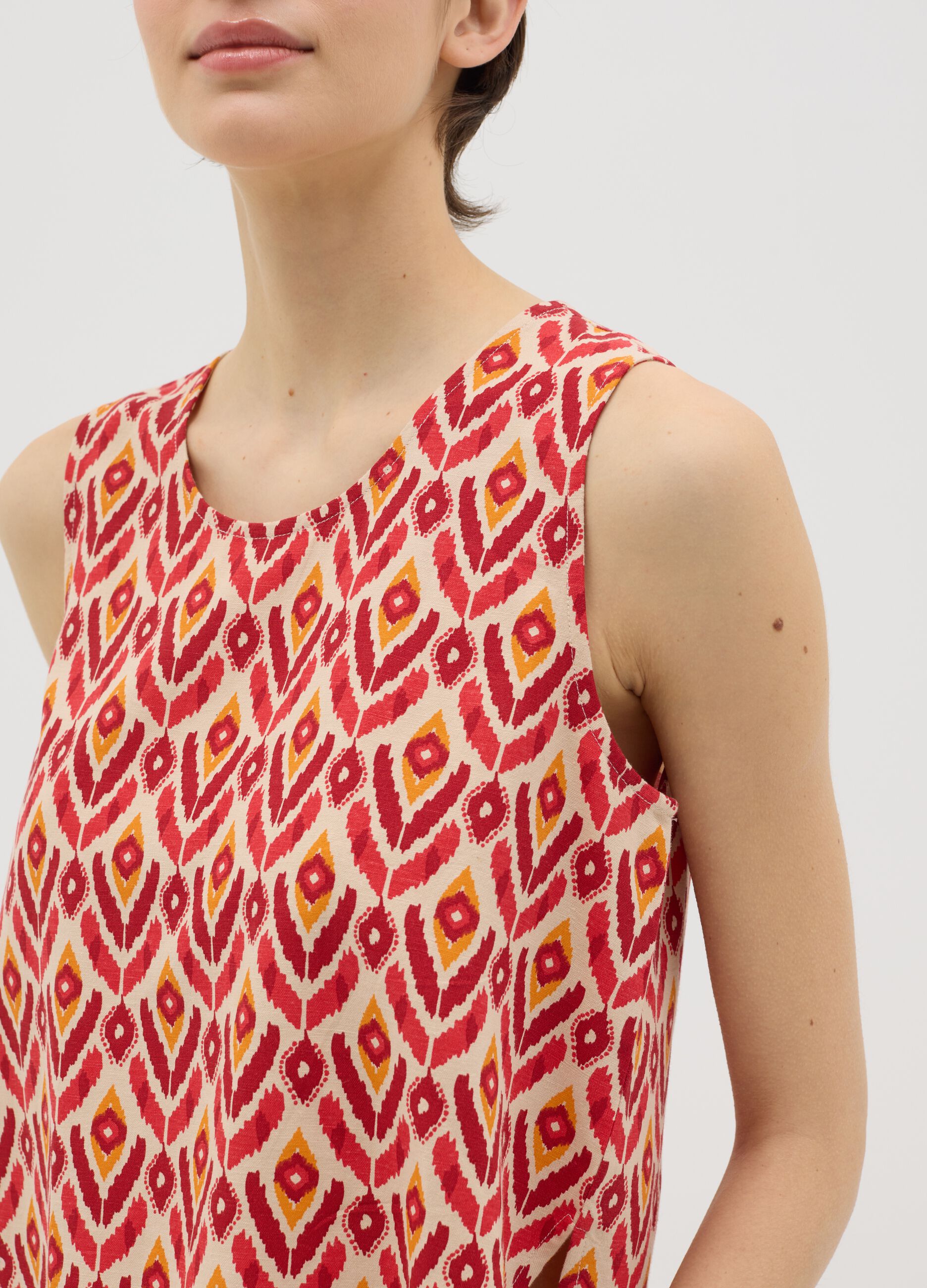 Beige tank top with ethnic pattern