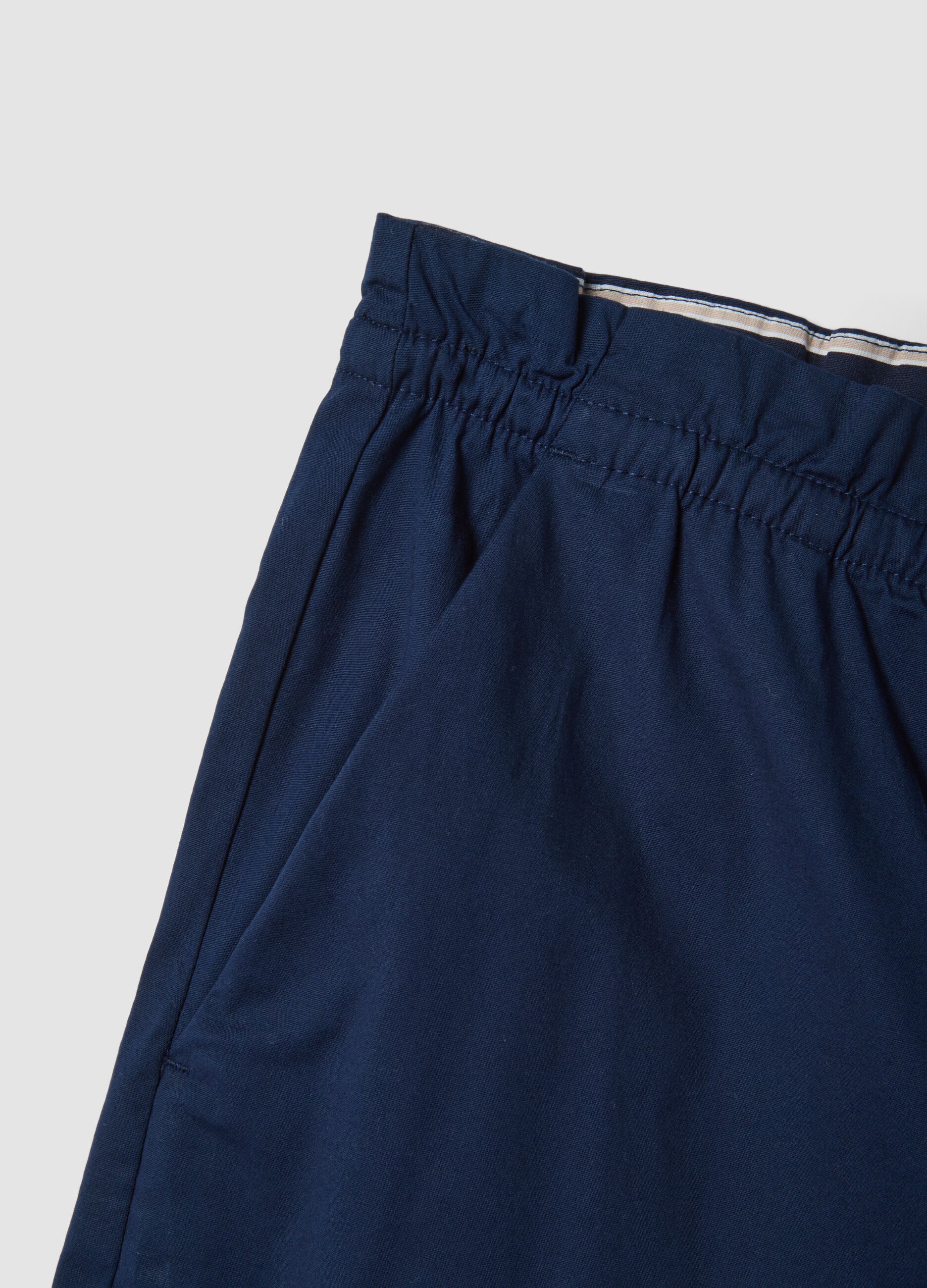 Blue stretch-cotton trousers with elasticated waist