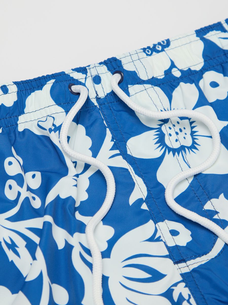 Blue floral print swimming trunks_5