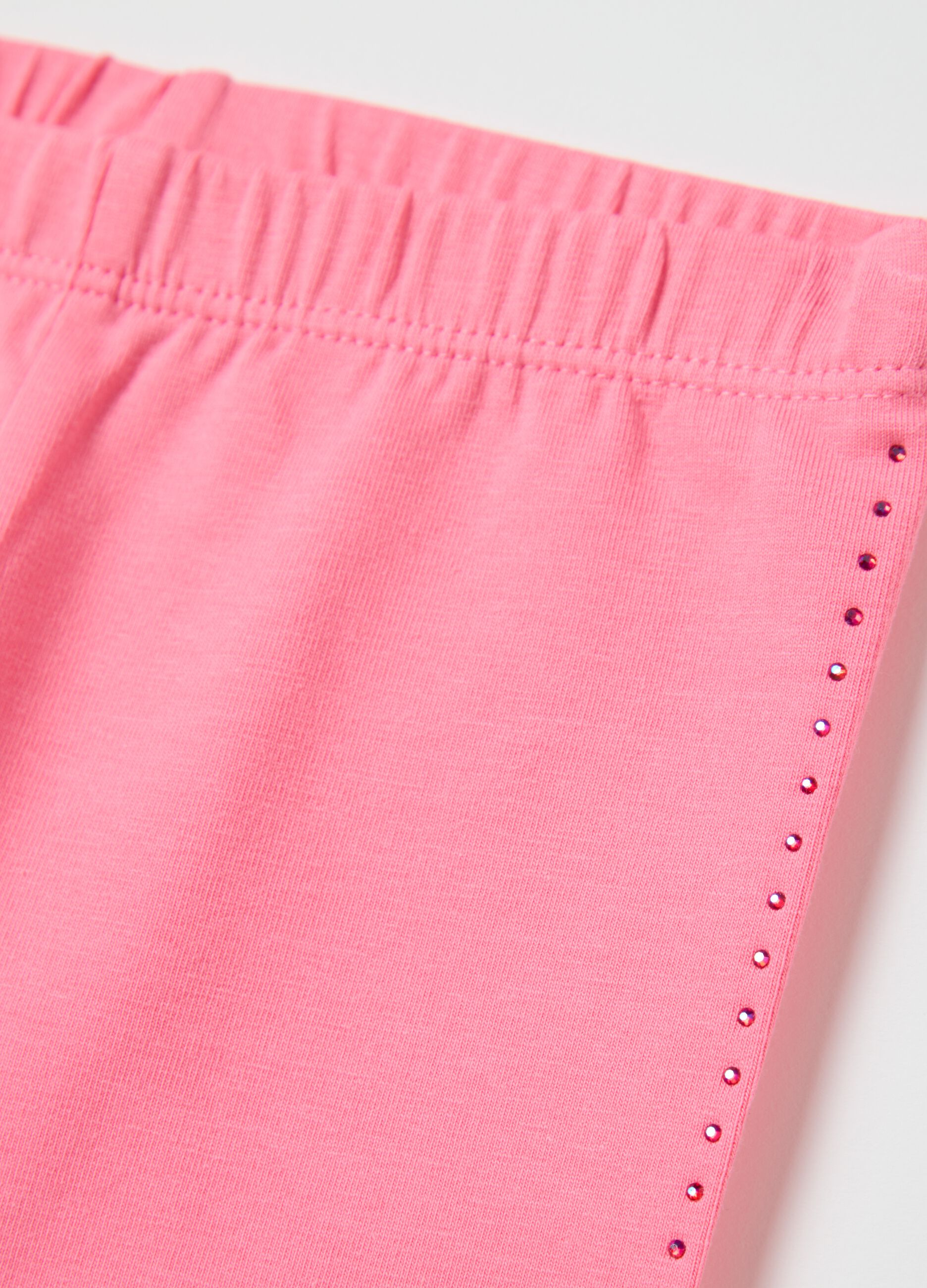 Pink three-quarter stretch leggings with diamantés