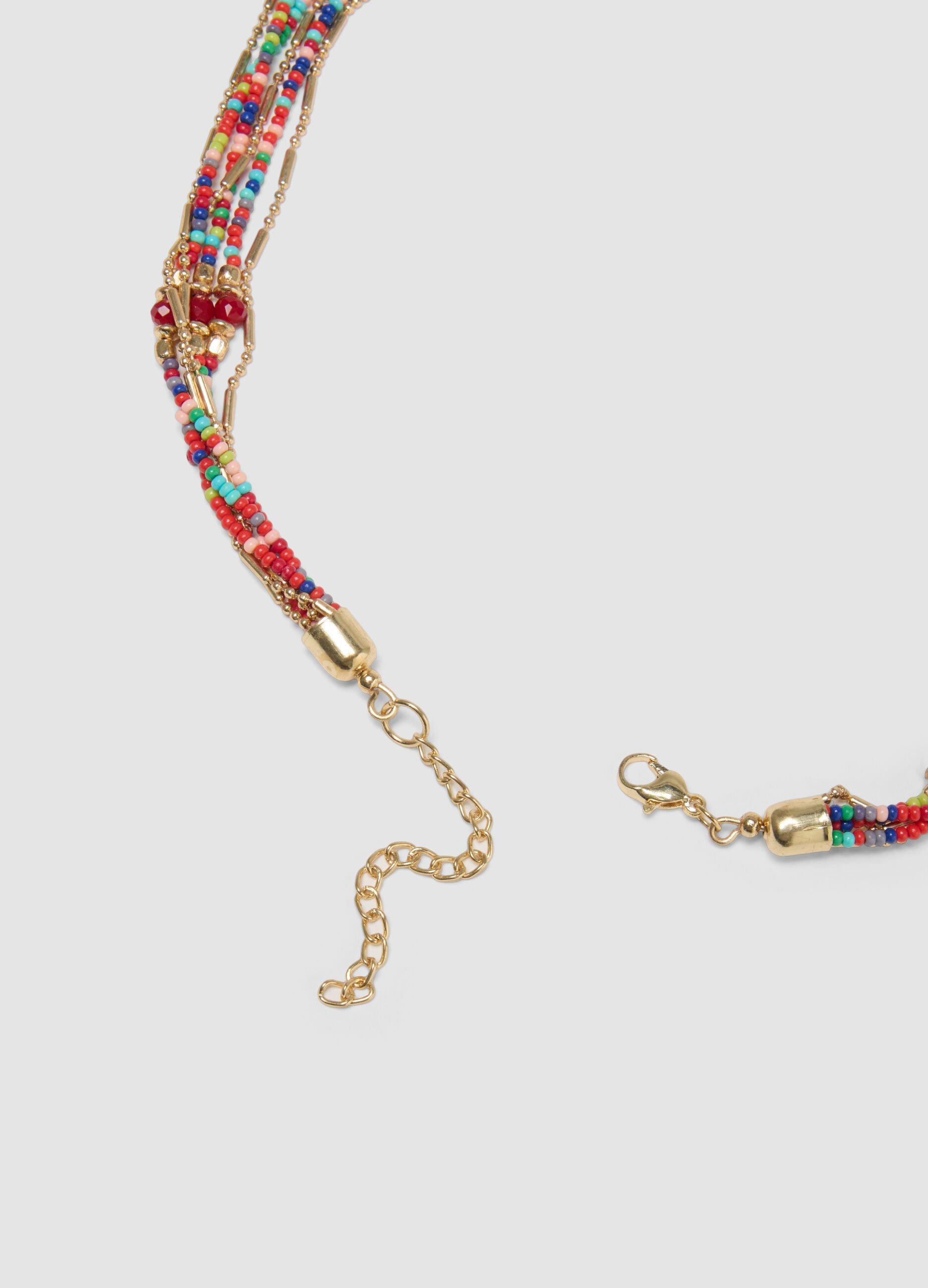 Multicolour necklace with red tassels