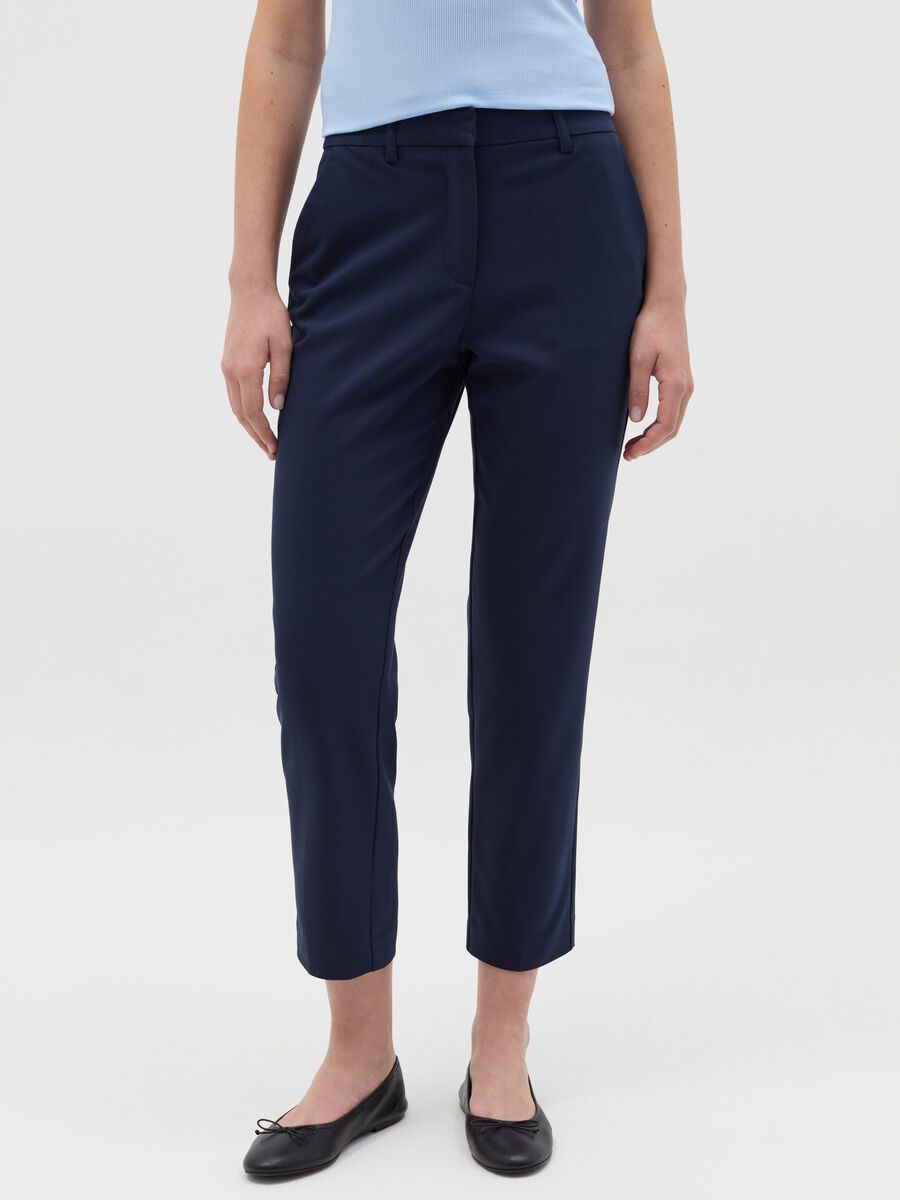 Chino trousers with pockets_1