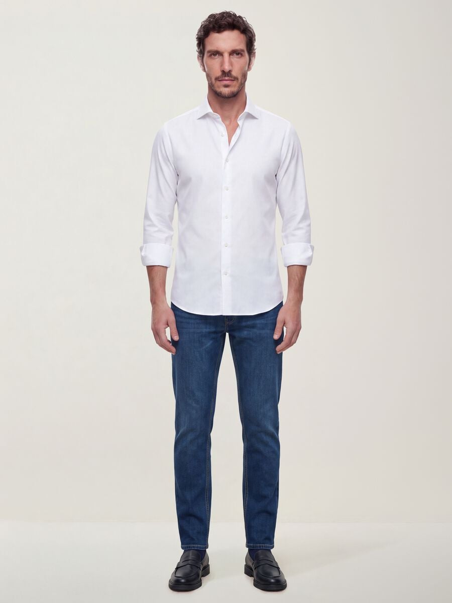 Dark-wash slim-fit stretch cotton jeans_0