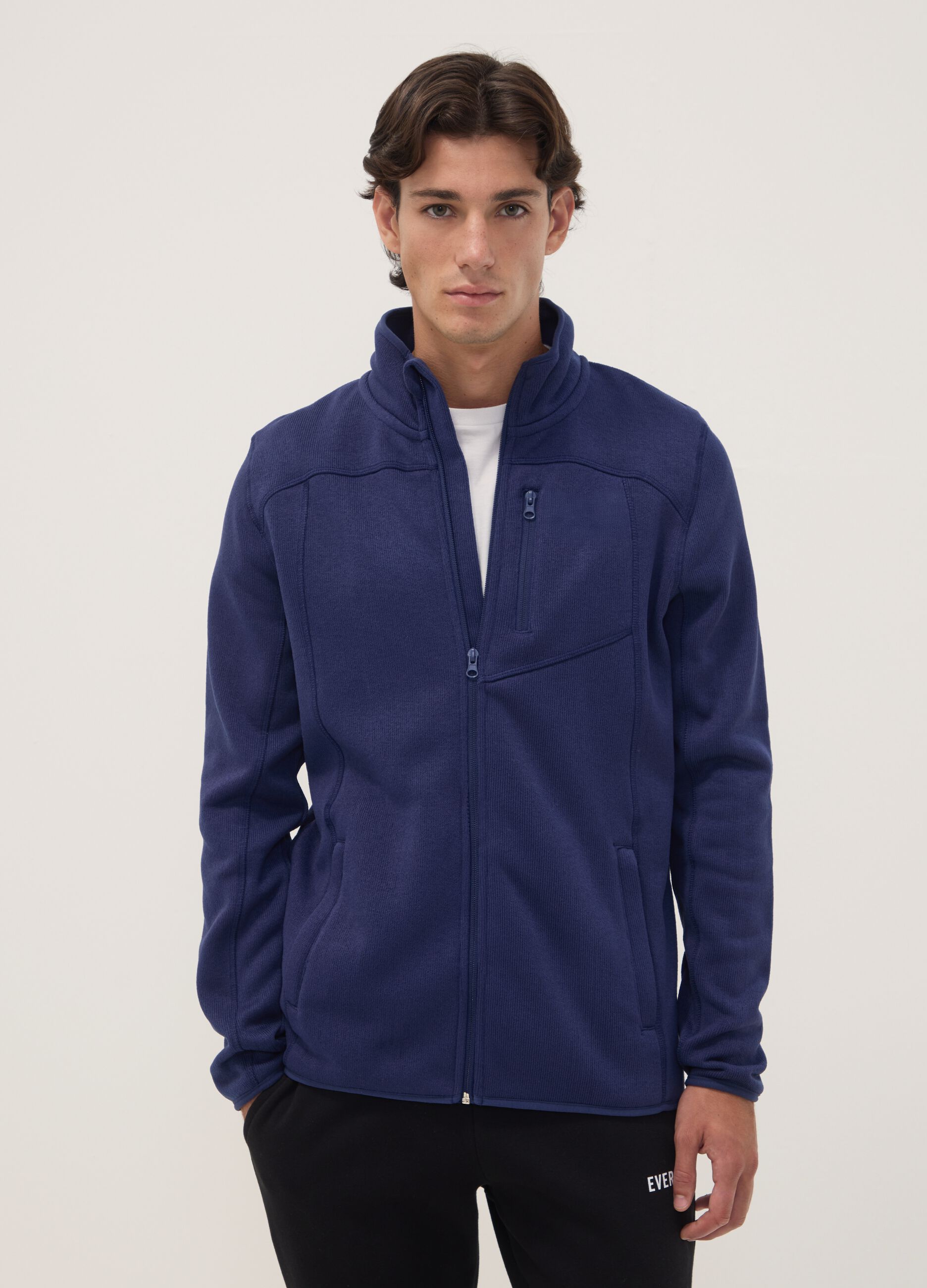 Blue full-zip sweatshirt with high neck and logo