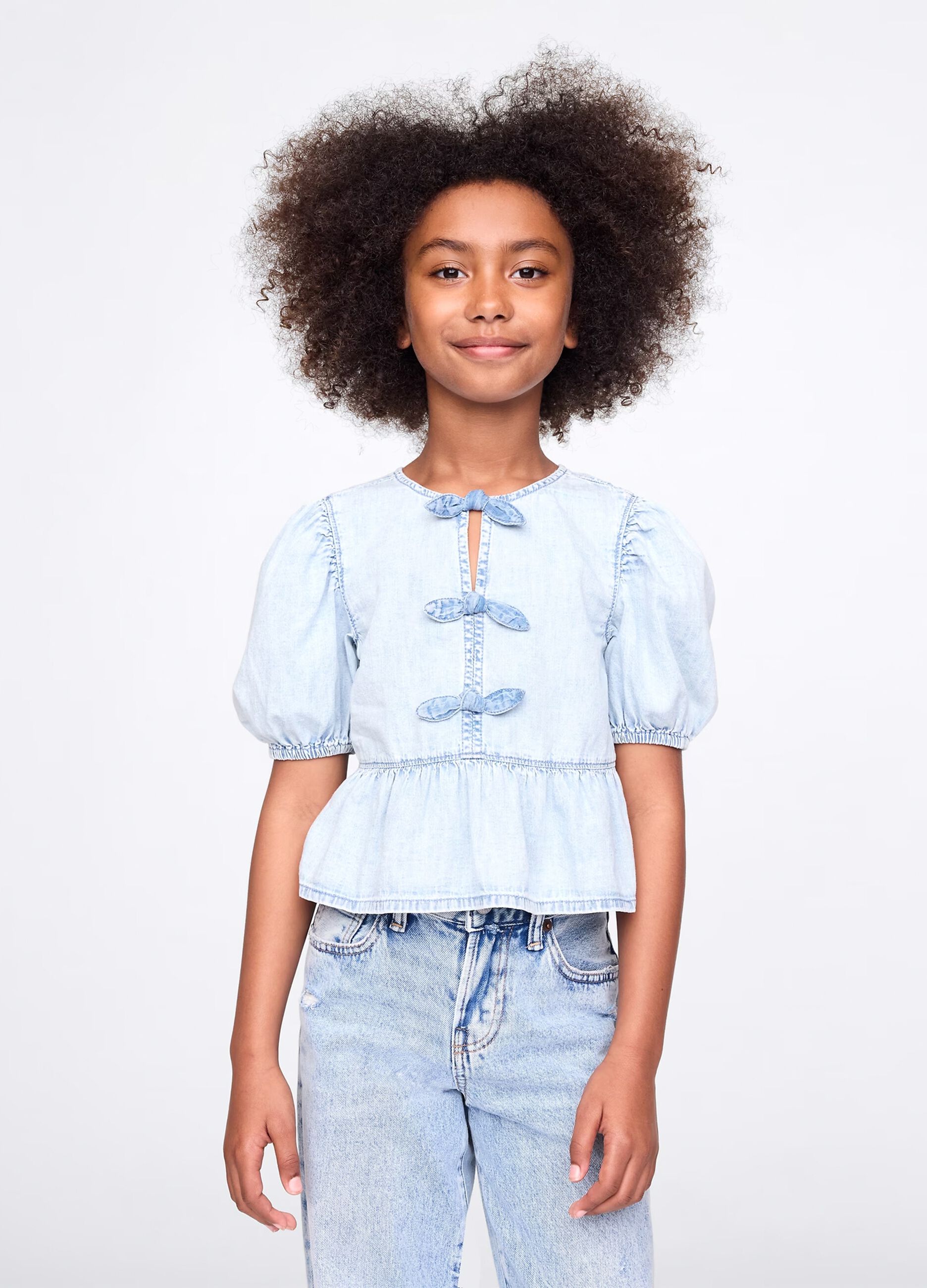 Denim shirt in cotton with bows
