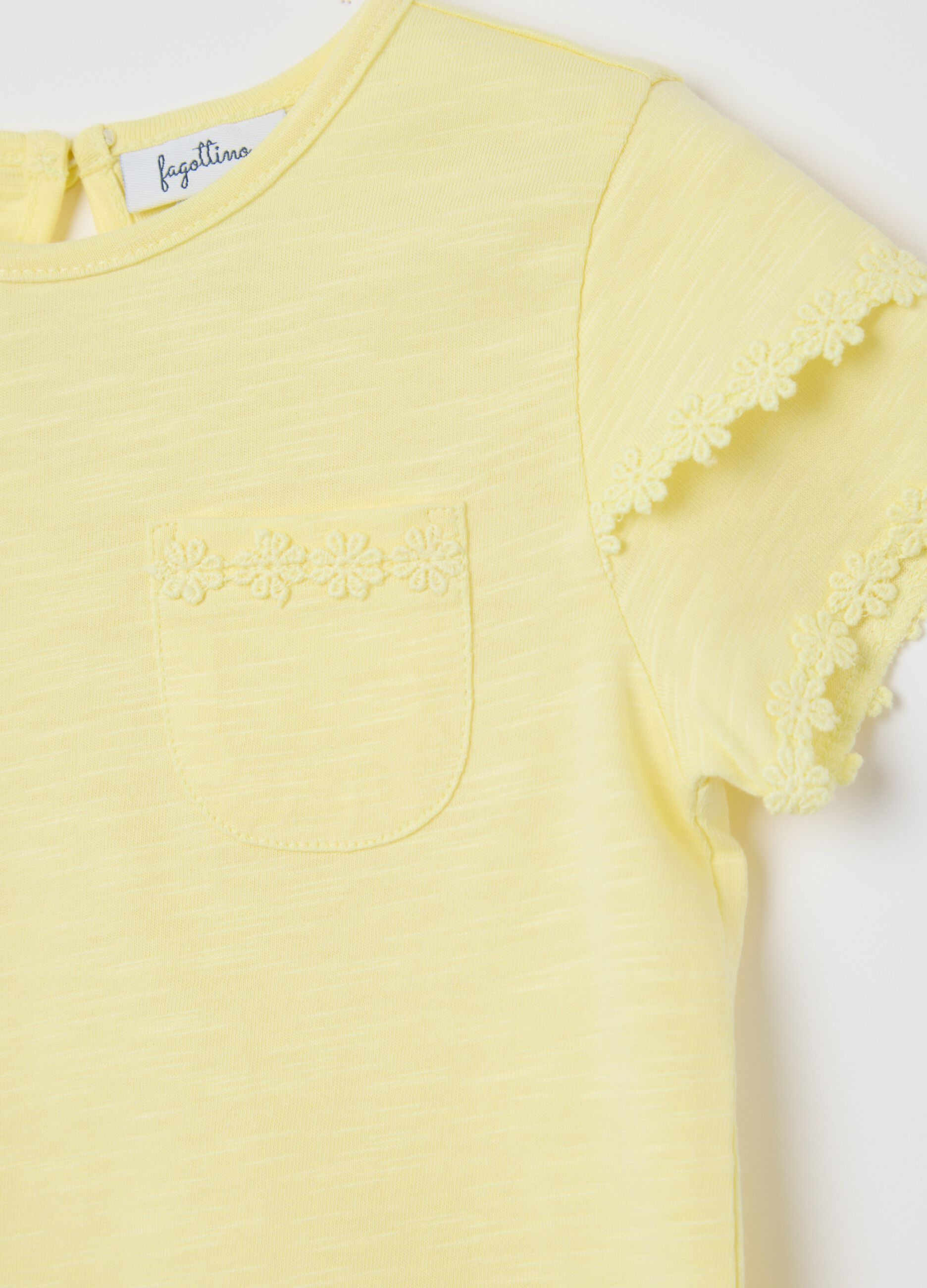 Yellow cotton T-shirt with crochet flowers