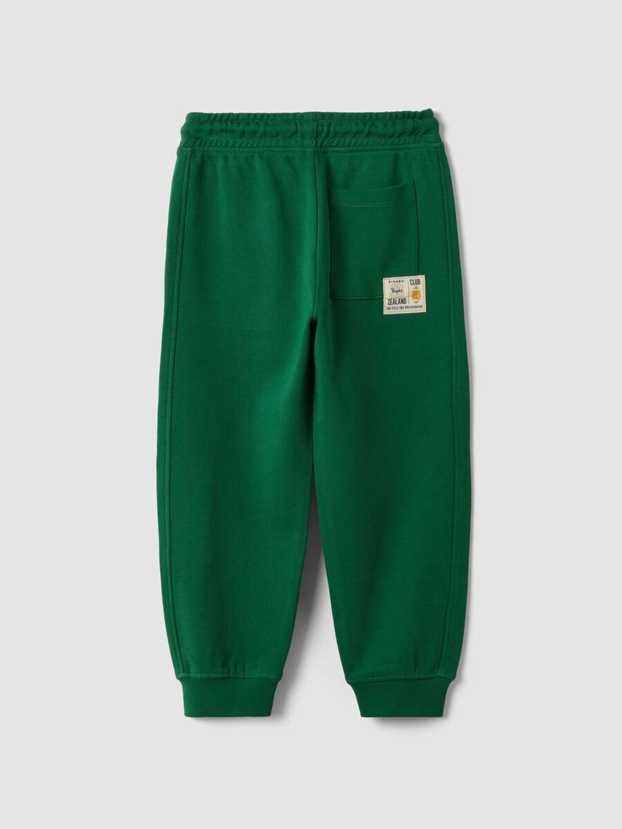 Pantaloni jogger verdi in puro cotone con vita elasticizzata per bambino_1