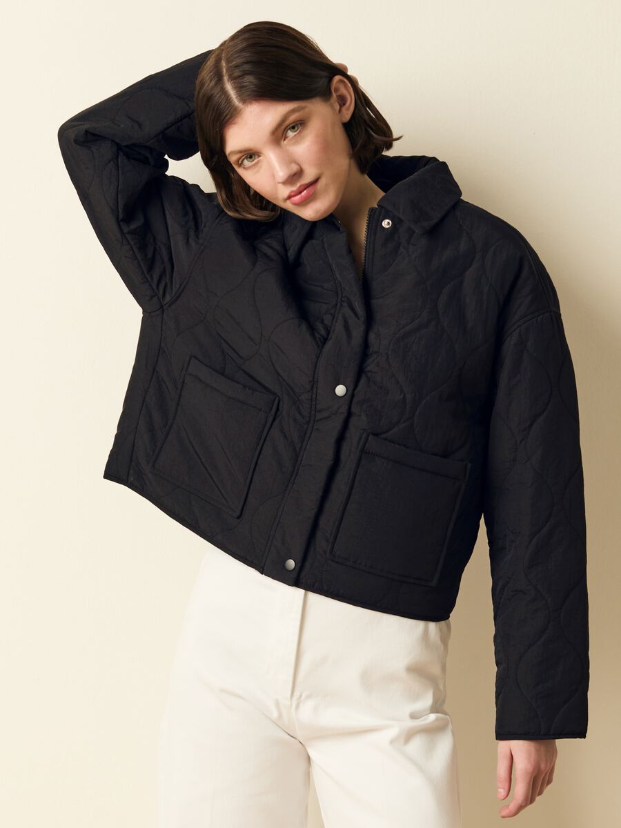 Short quilted jacket with buttons_1