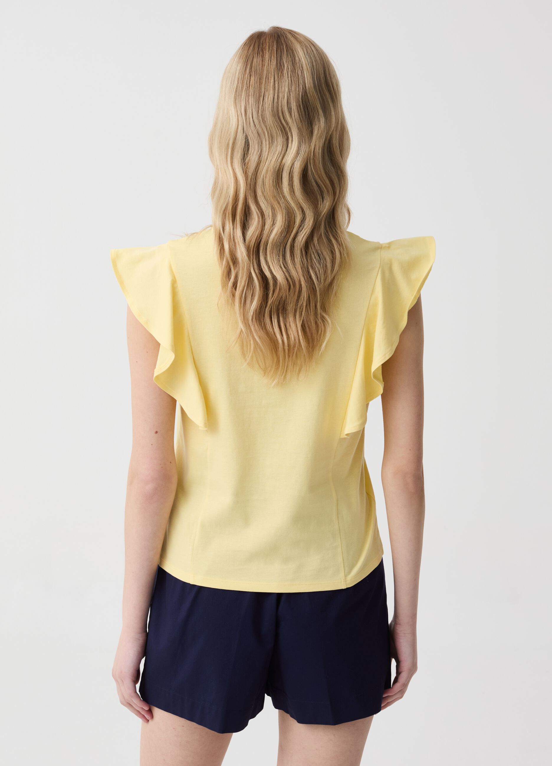 Sleeveless T-shirt with V neck and flounce