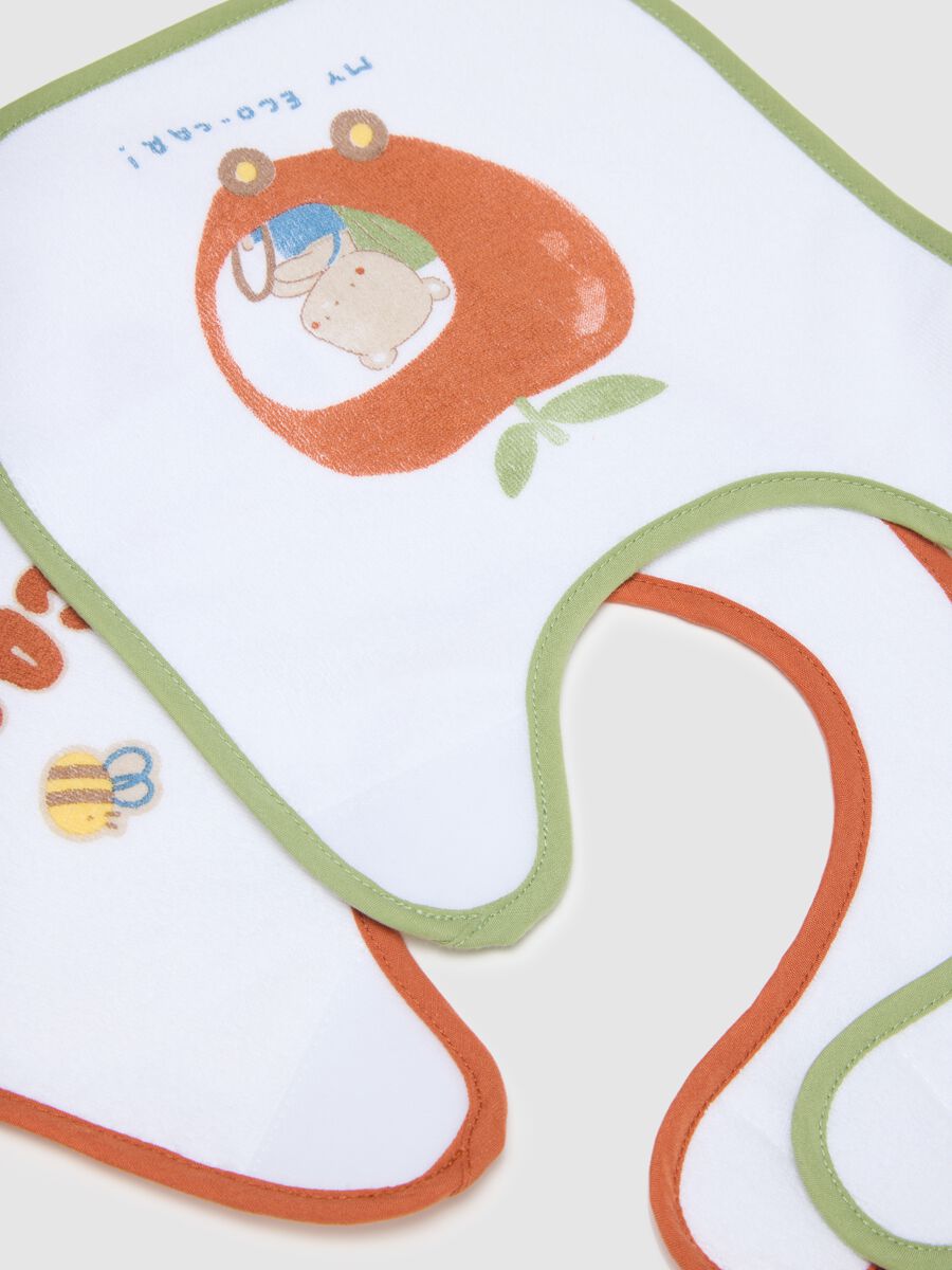 Two-pack white cotton blend bibs with velcro and prints_1
