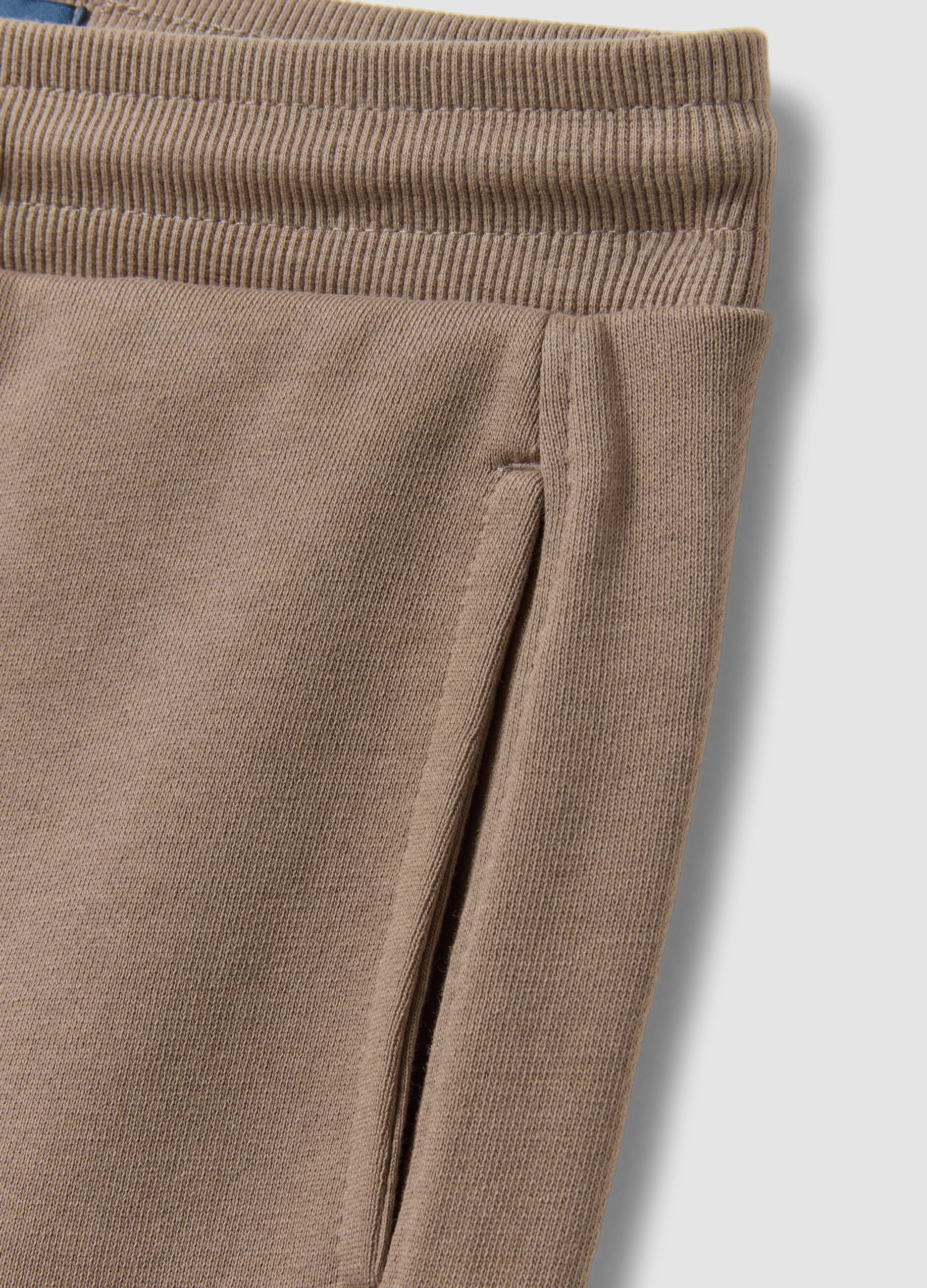 Pantaloni jogger beige in cotone organico