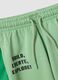 Completo bianco e verde in puro cotone con t-shirt e shorts per bambino over fit_3